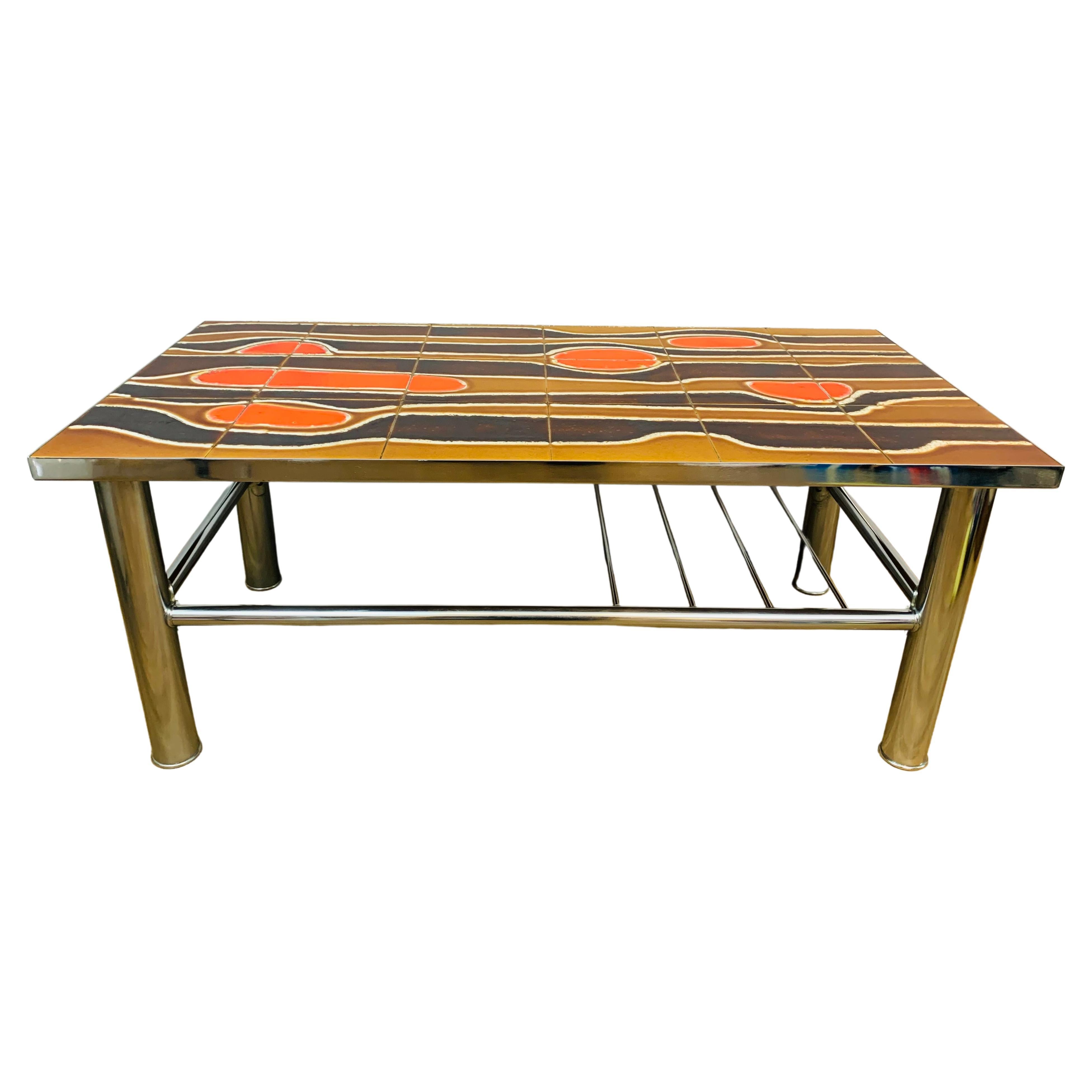 1960s Mid Century Belgium Abstract Ceramic Tile 
Polished Chrome Coffee Table