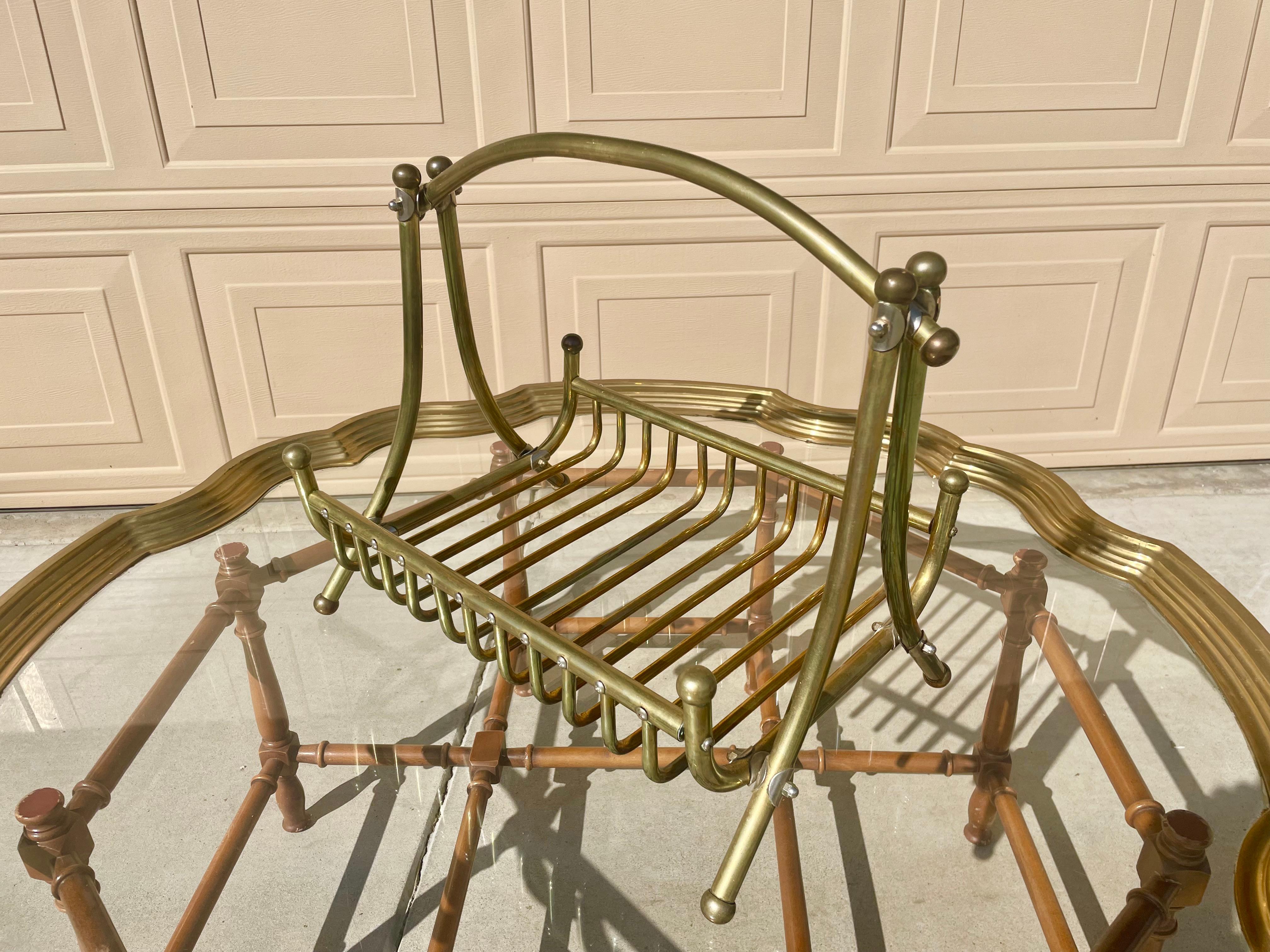 Mid-century brass magazine rack, This beautiful magazine rack is made out of brass, giving it that unusual style, making it one of a kind.