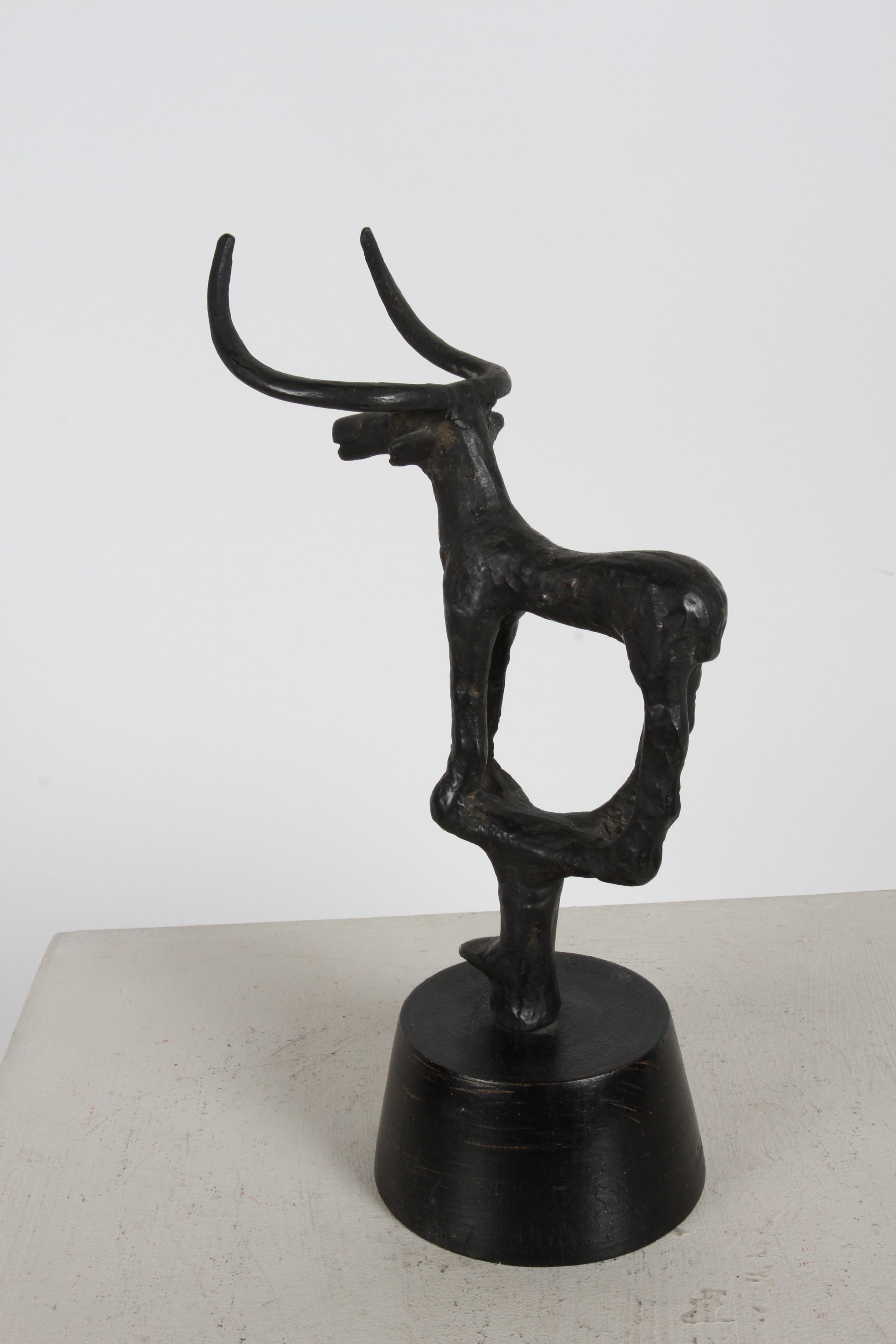 1960s Mid-Century Bronze Age Reproduction Bronze Bull Sculpture on Wood Base In Good Condition For Sale In St. Louis, MO