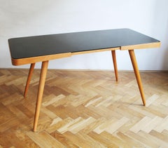 1960's Mid Century Coffee Table With a Black Opaxite Glass