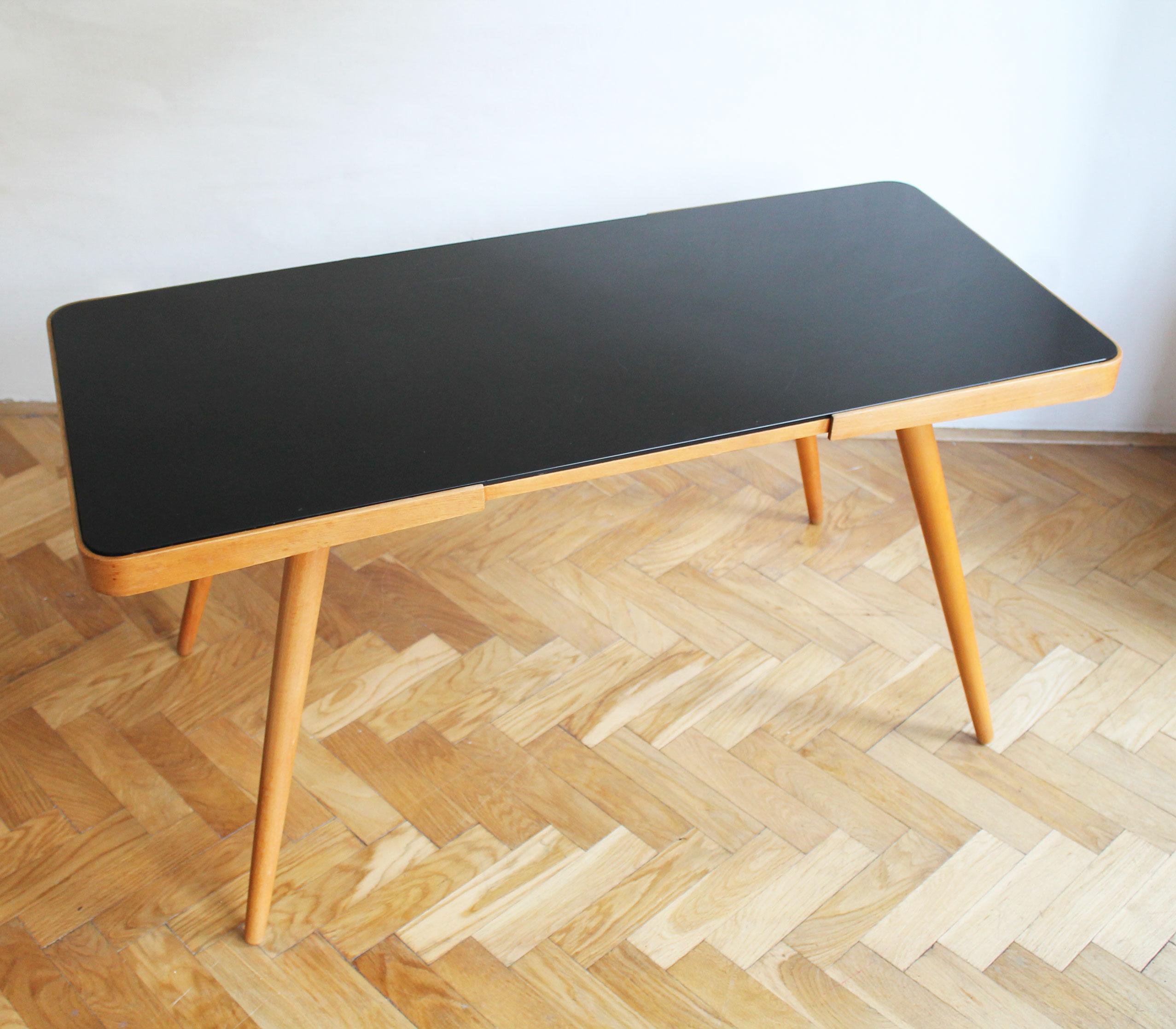 Mid-Century Modern 1960's Mid Century Coffee Table With a Black Opaxite Glass For Sale