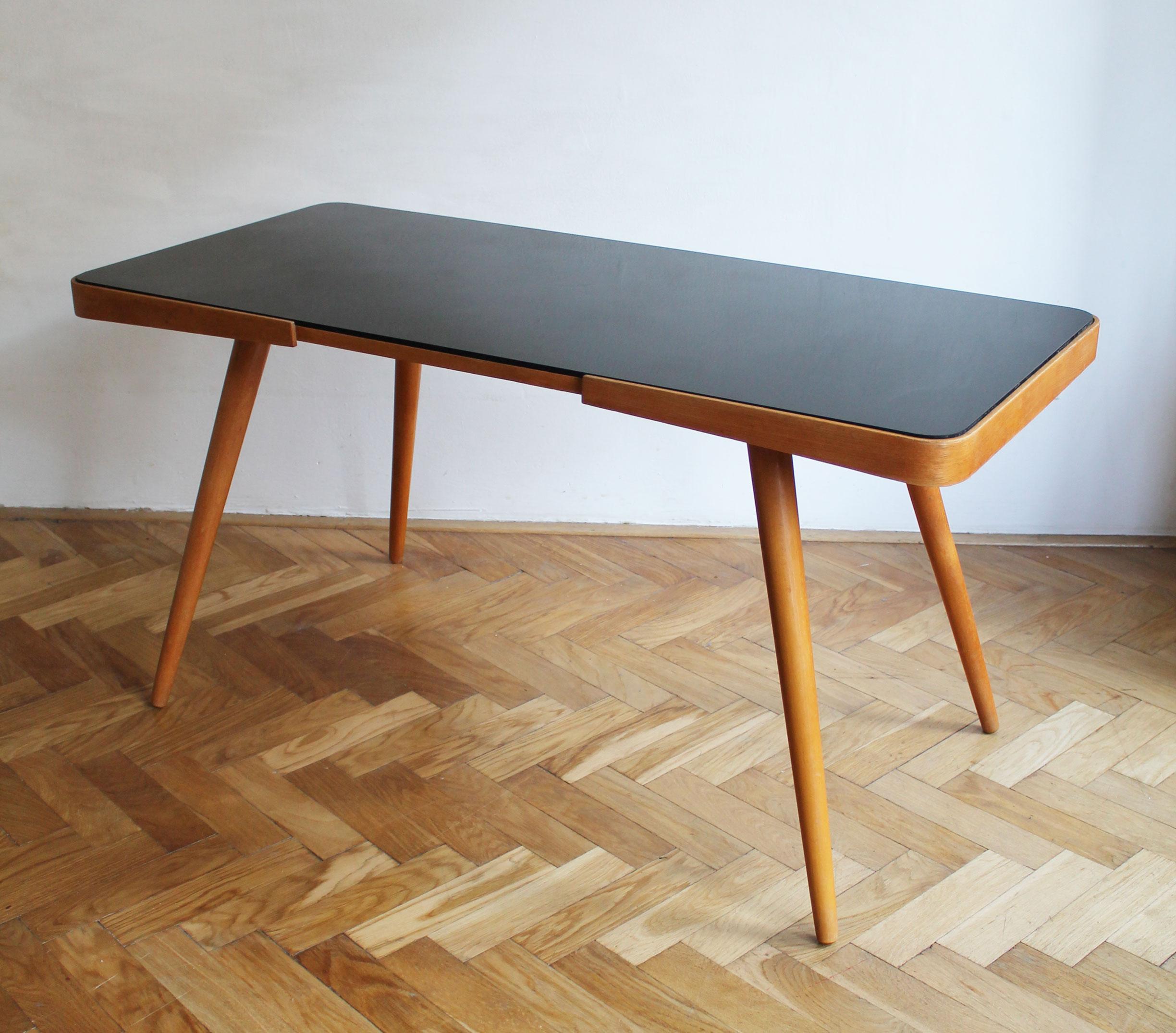 Cast 1960's Mid Century Coffee Table With a Black Opaxite Glass For Sale