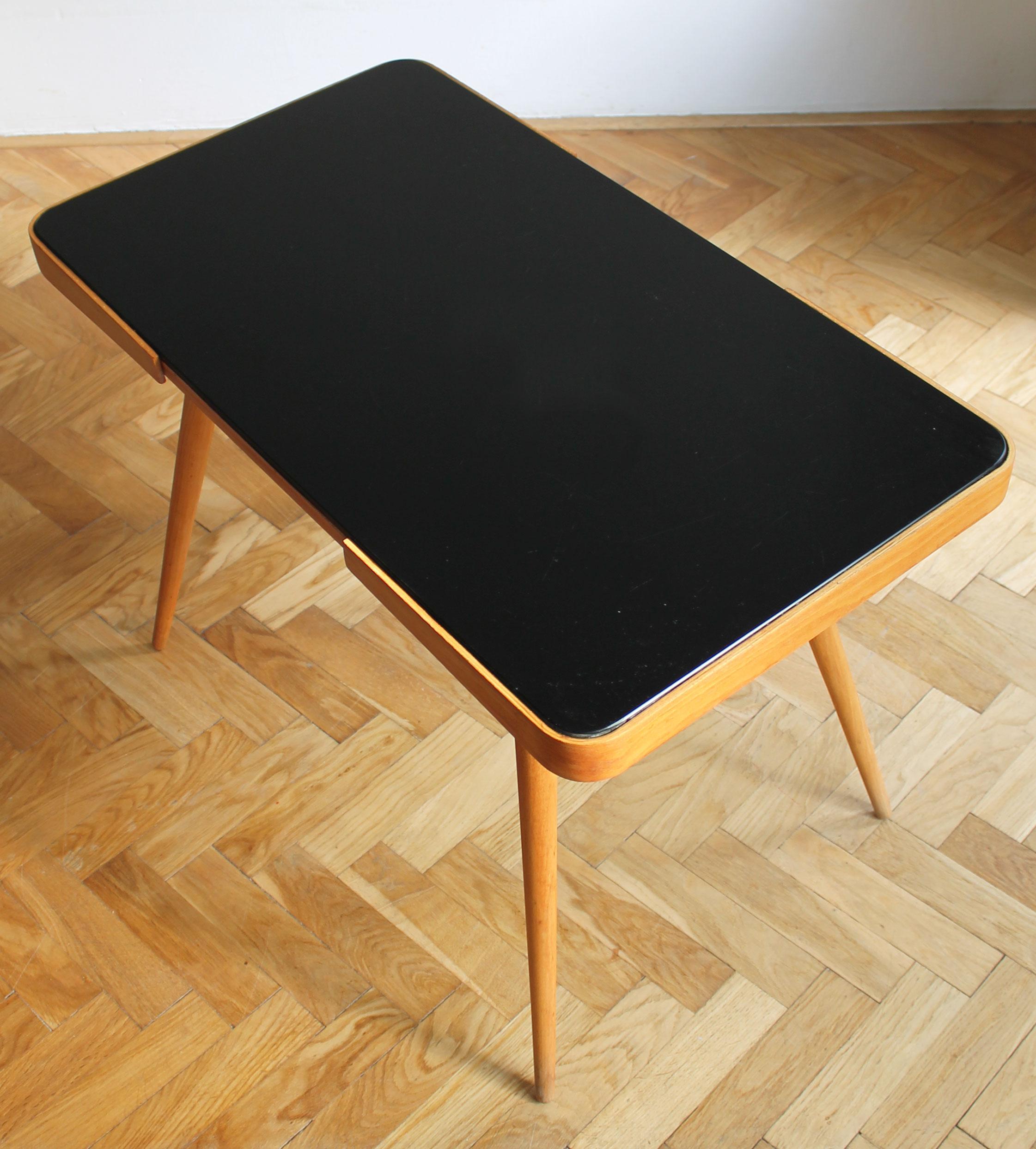 Lacquered 1960's Mid Century Coffee Table With a Black Opaxite Glass - Smaller version For Sale