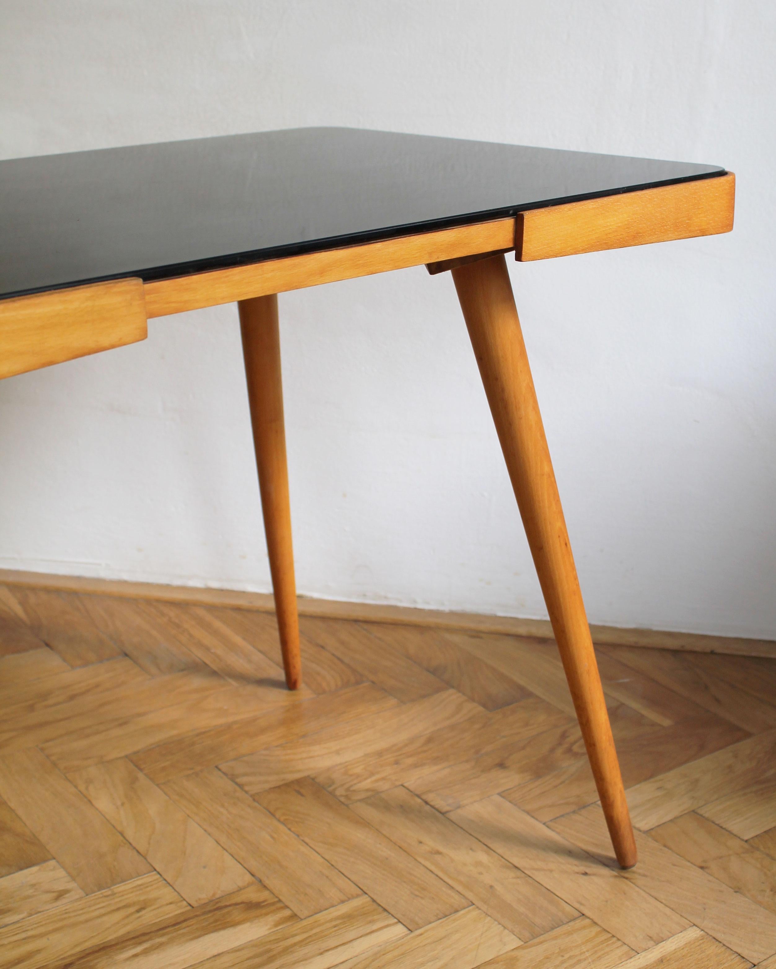 1960's Mid Century Coffee Table With a Black Opaxite Glass - Smaller version For Sale 1