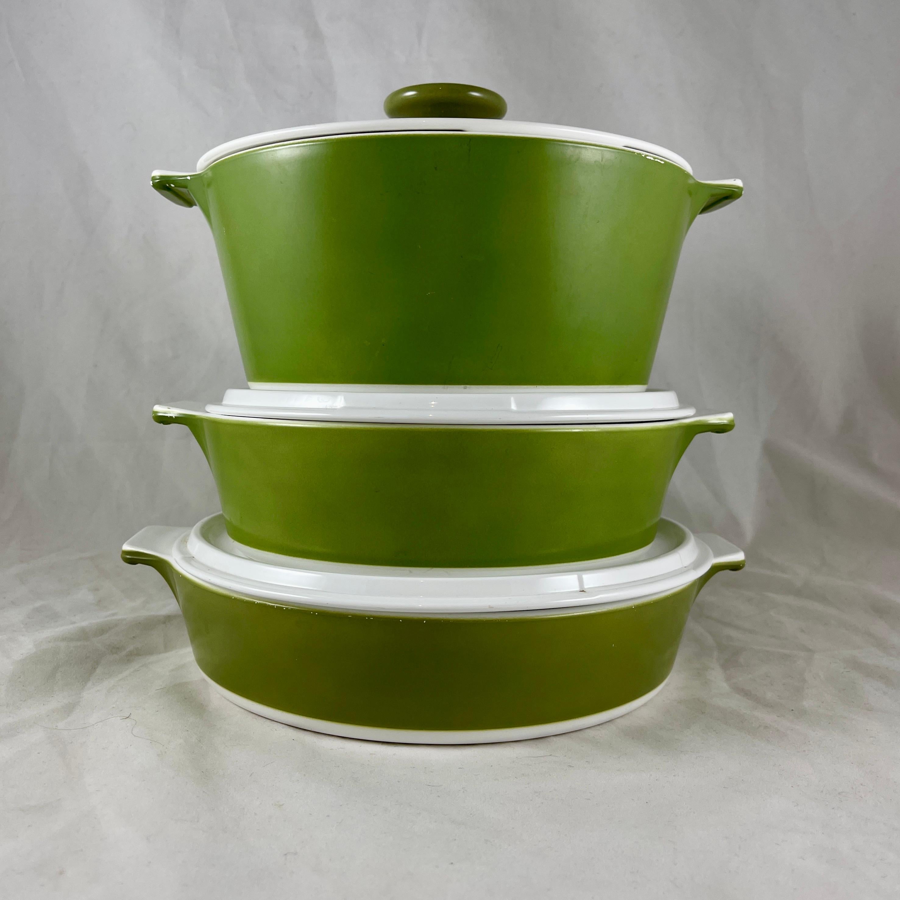 A set of three mid-century era Corning Ware casserole dishes from the ‘Avocado Round’ line, circa 1968-1970.

Corning Ware revolutionized the mid-century kitchen and the original pieces are now considered to be highly collectible.

The covered