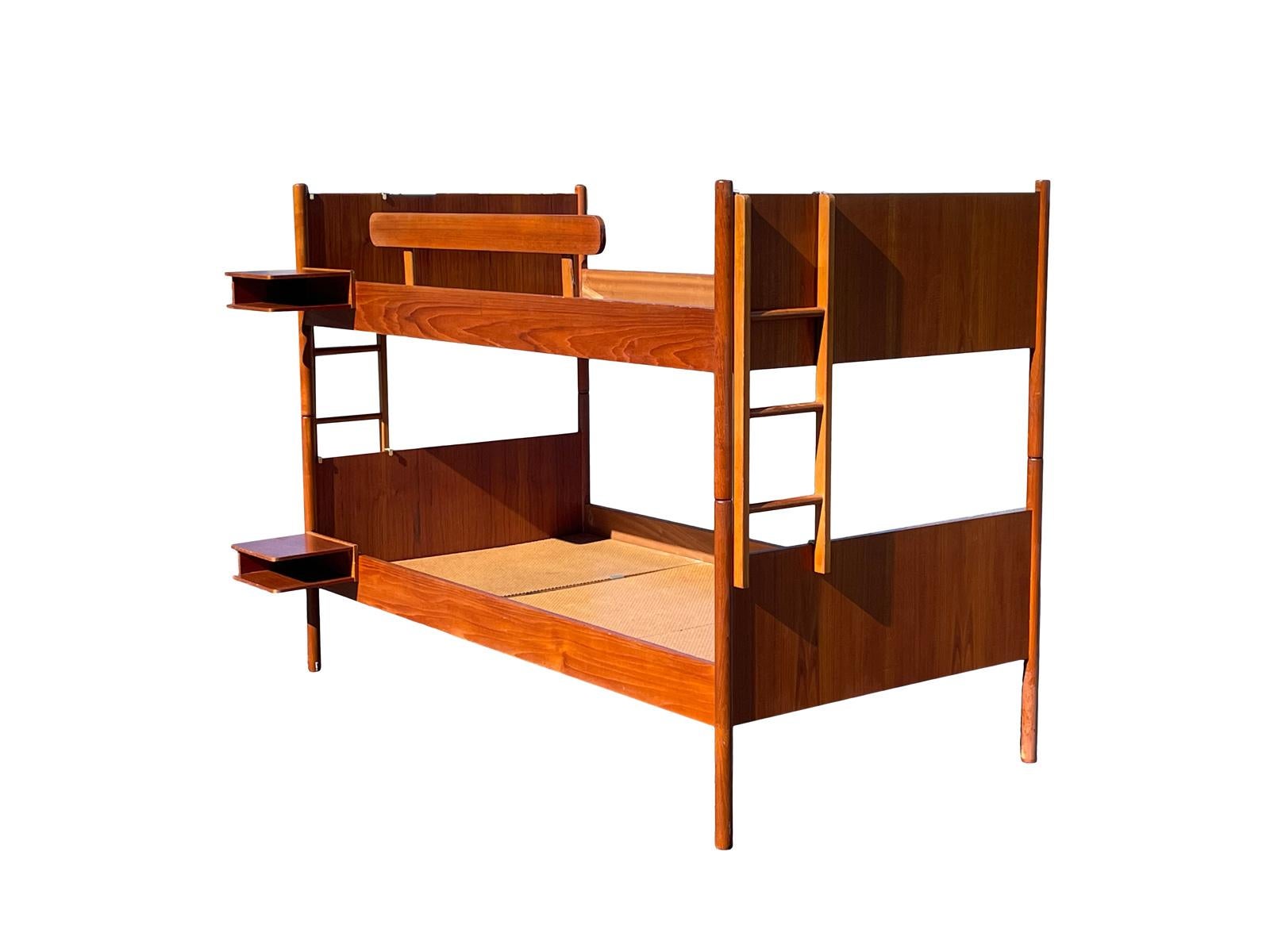 Complete danish teak bunk bed set very easily assembled great condition includes 2 rearrangeable ladders and 2 shelves 