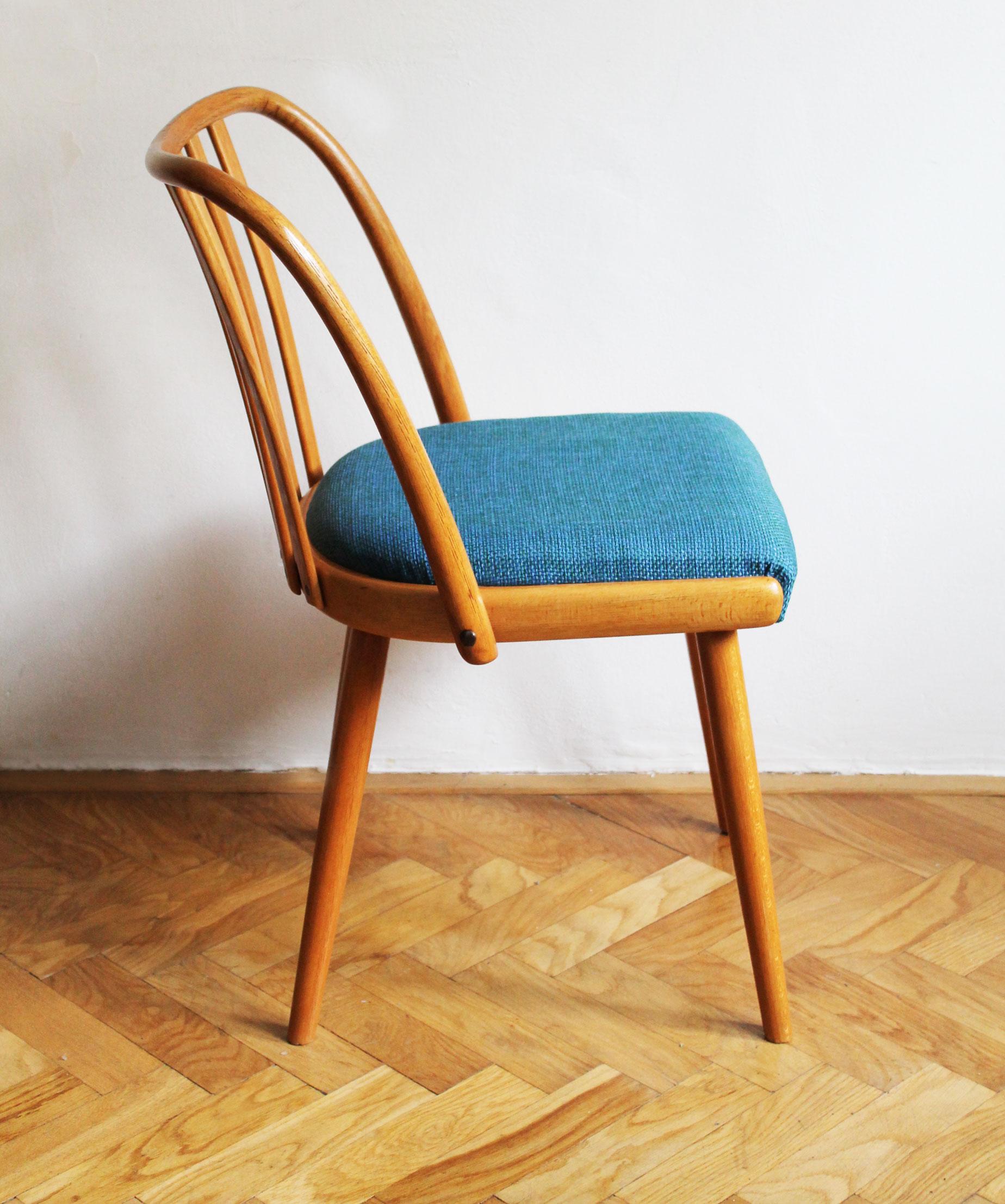 This is a dining chair model U -300 and it was produced by Interier Praha Company in former Czechoslovakia.

This simple slender beech frame dining chair was designed in 1960’s by the renown Czech furniture designer Antonin Suman. The softly curved