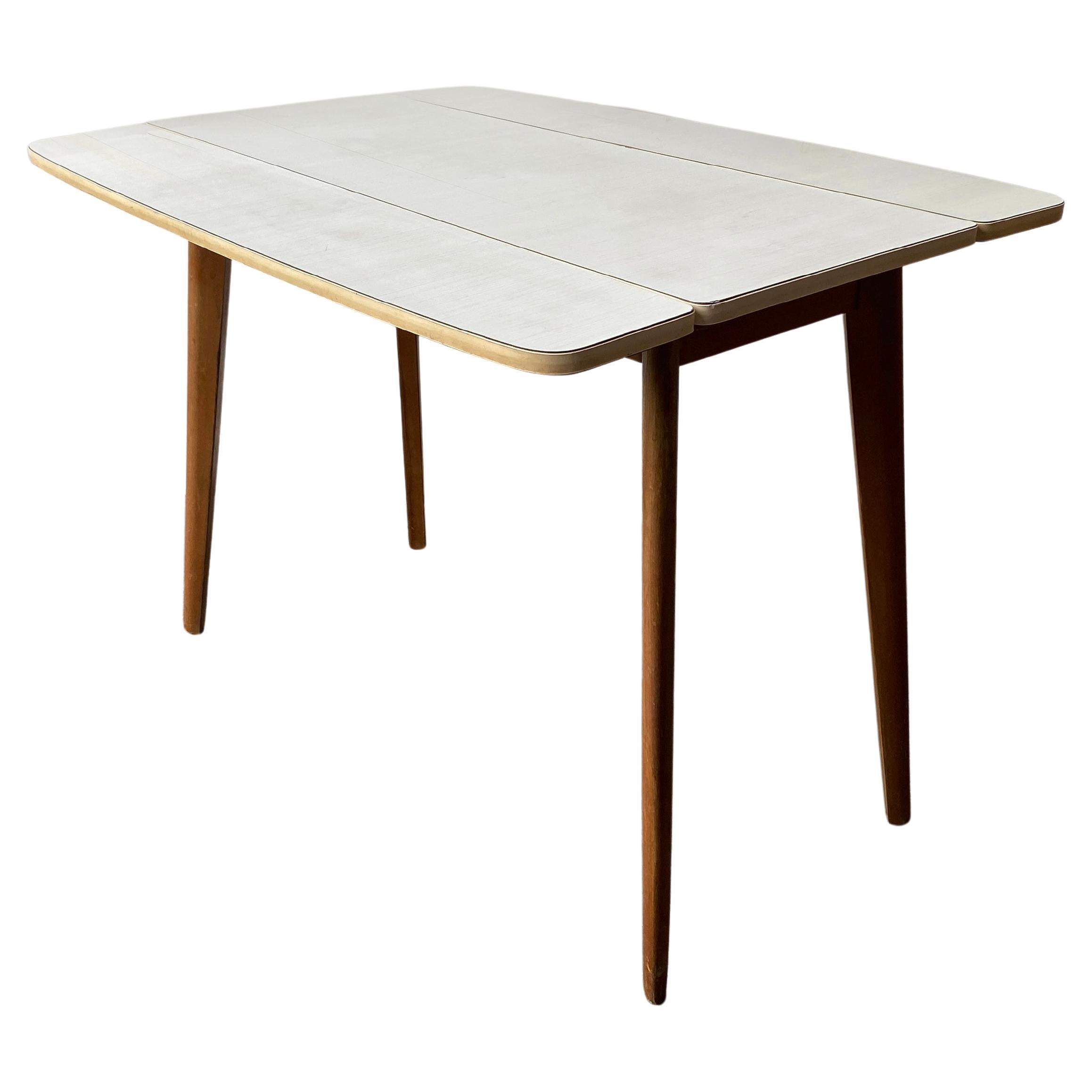 1960s Mid-Century extending drop leaf kitchen table For Sale