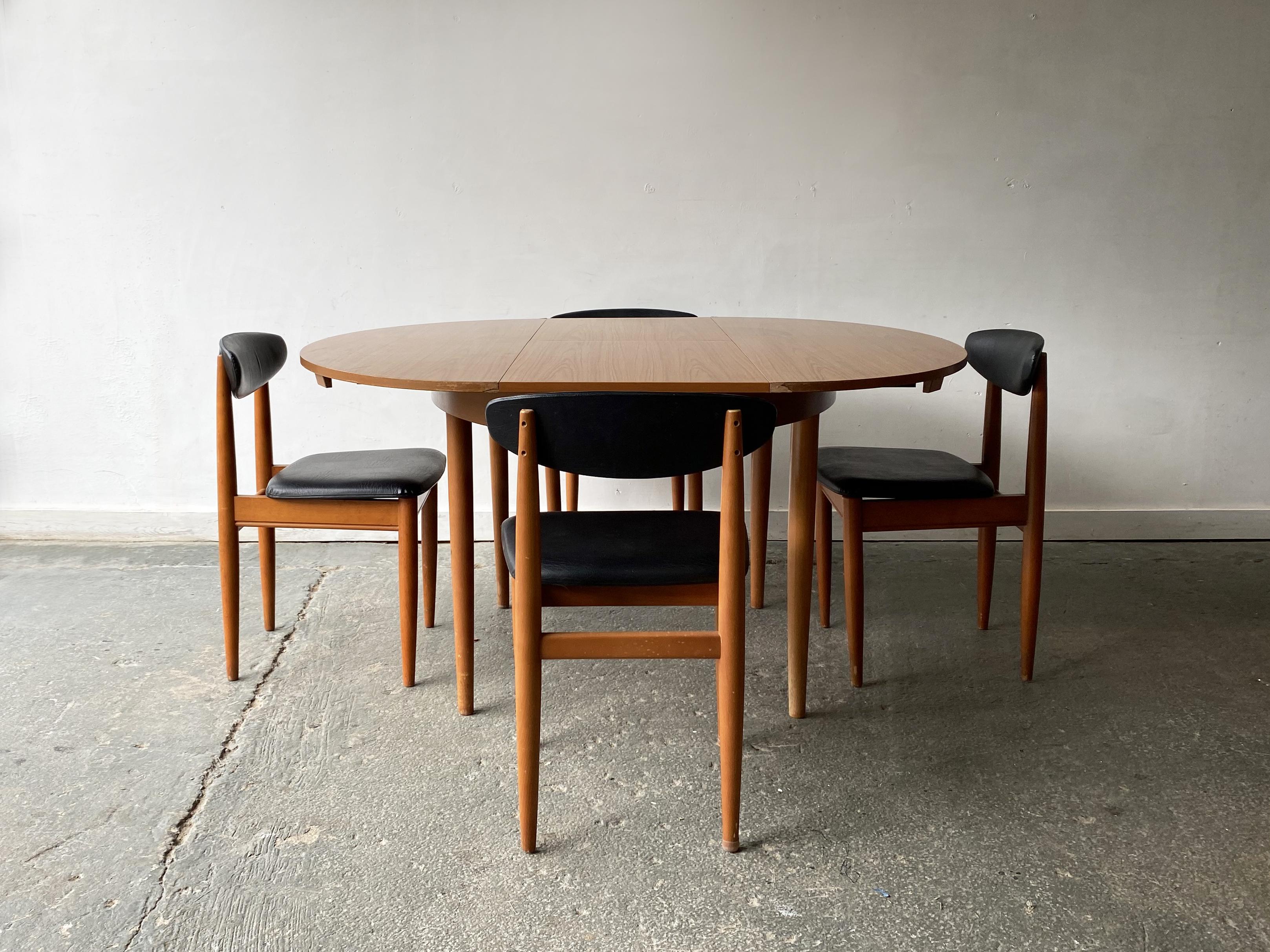 British 1960’s mid century Formica dining table and dining chairs by Schreiber For Sale
