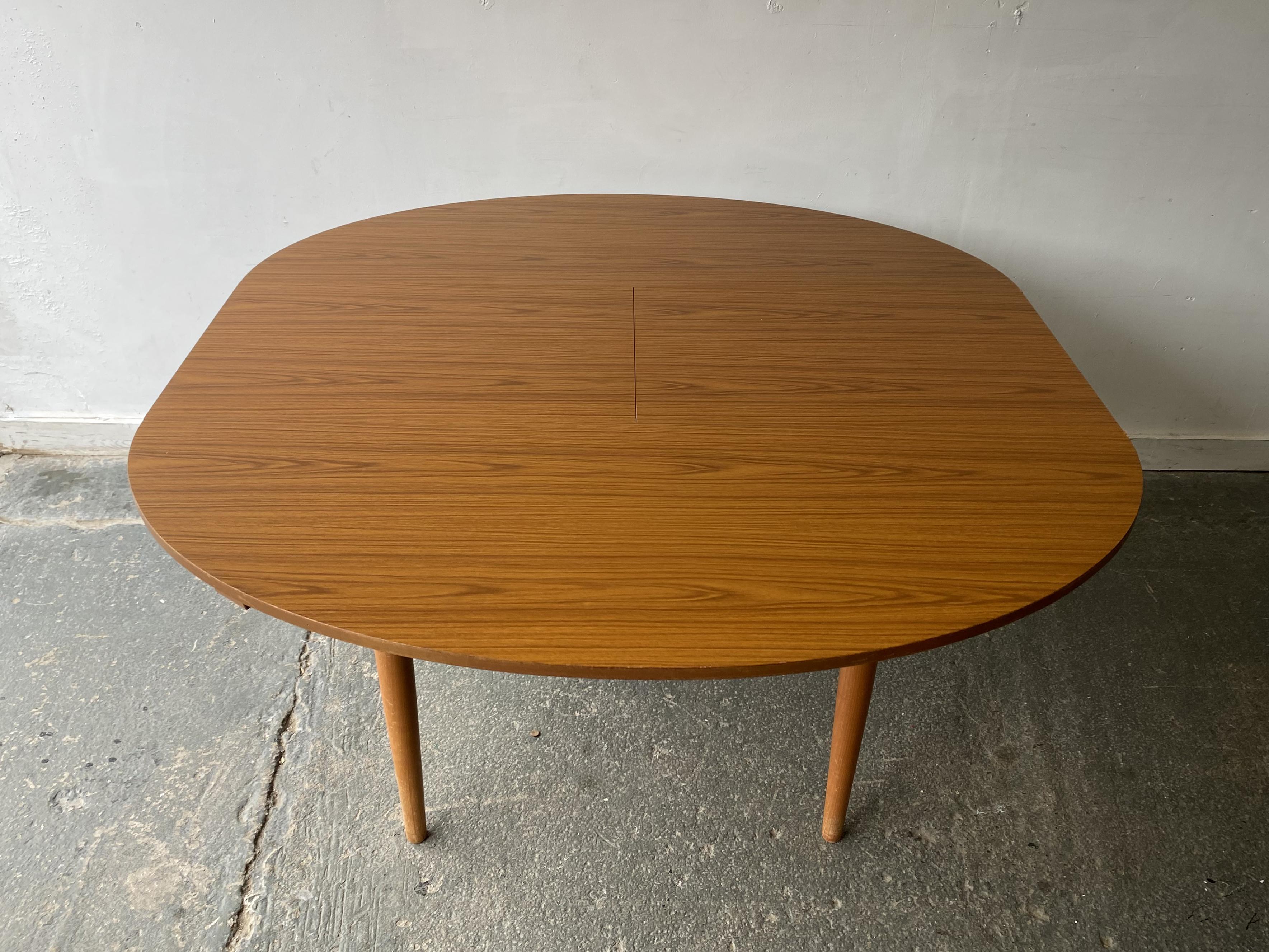 Faux Leather 1960’s mid century Formica dining table and dining chairs by Schreiber For Sale