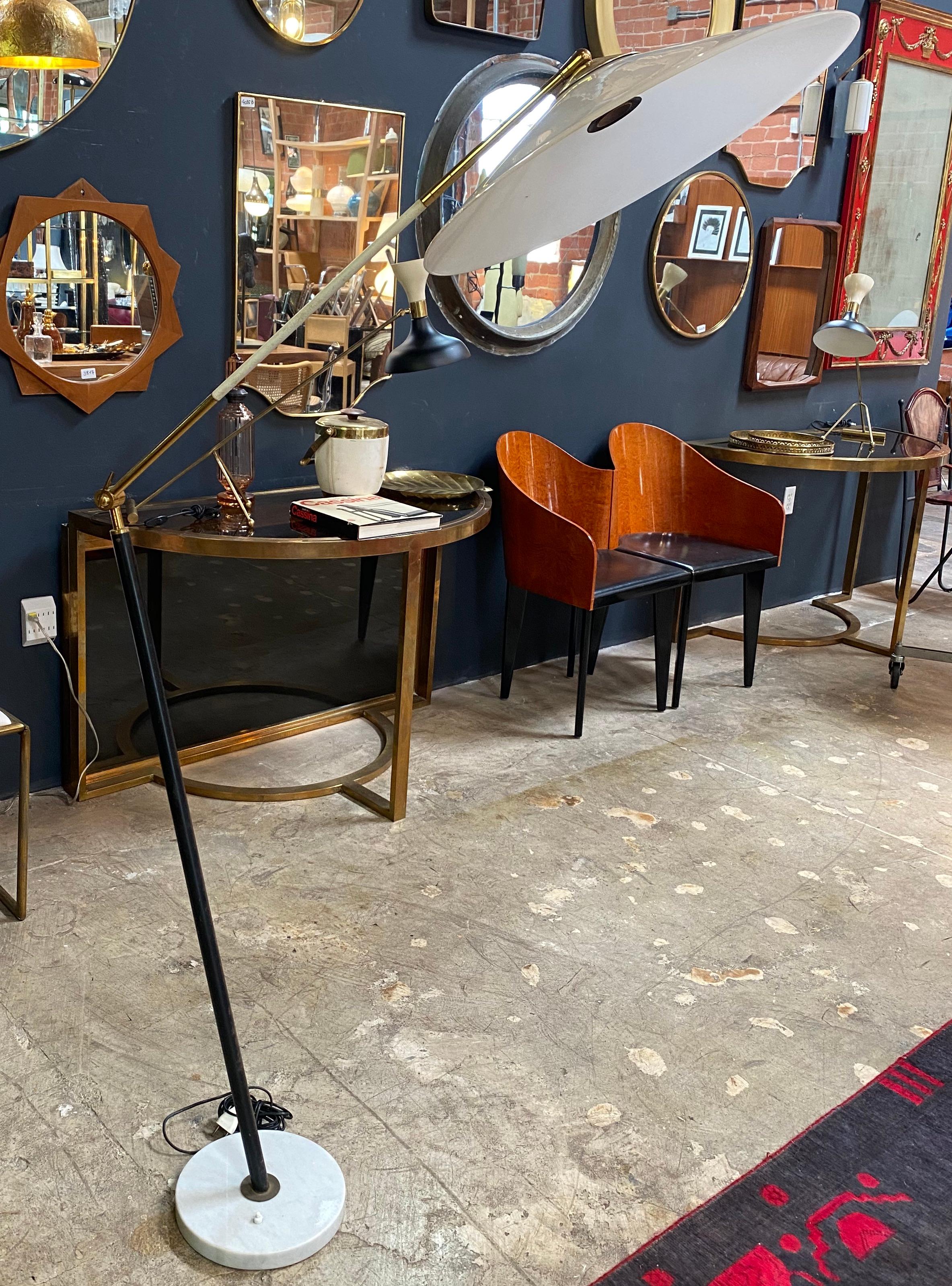 Beautiful Italian Floor lamp made with marble base, the lamp is in very good condition by Stilux. An elegant and simple item that will complete a midcentury living room or study.