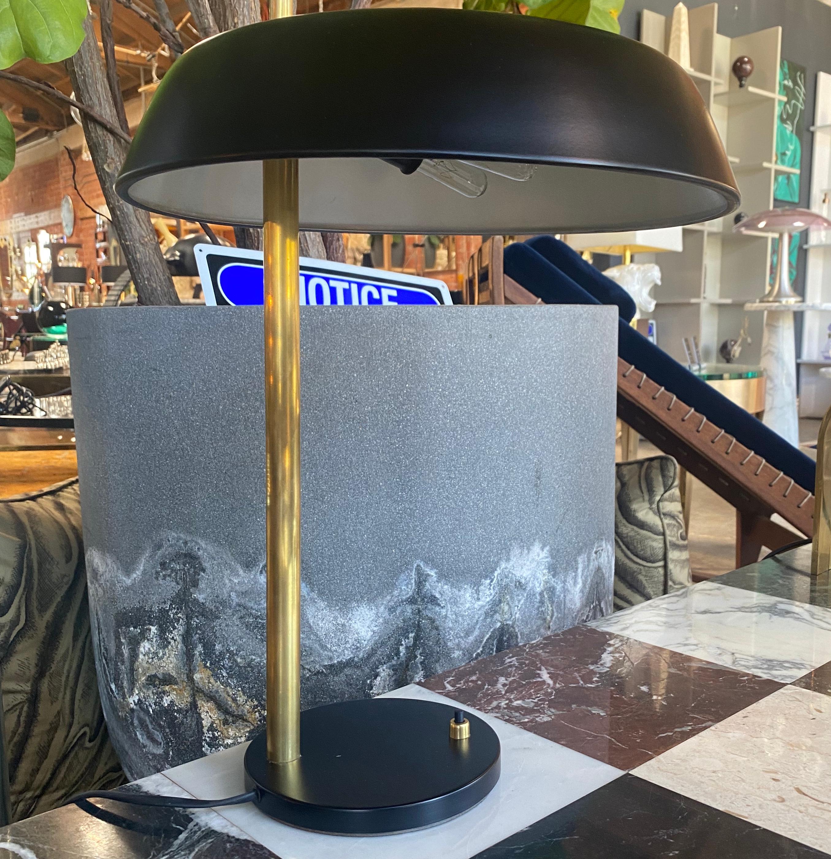 Beautiful table lamp made In Italy 1960s. The lamp is in vintage conditions and is rewired us. An elegant and simple item that will complete a midcentury living room or study.