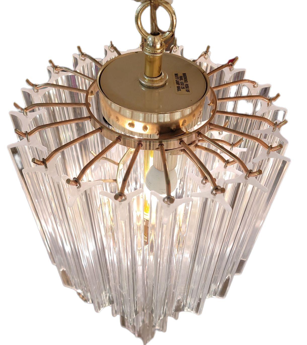 Midcentury Large Three Tier Lucite Waterfall Chandelier with brass frame- Measures Approx. 19 high x 24 diameter.