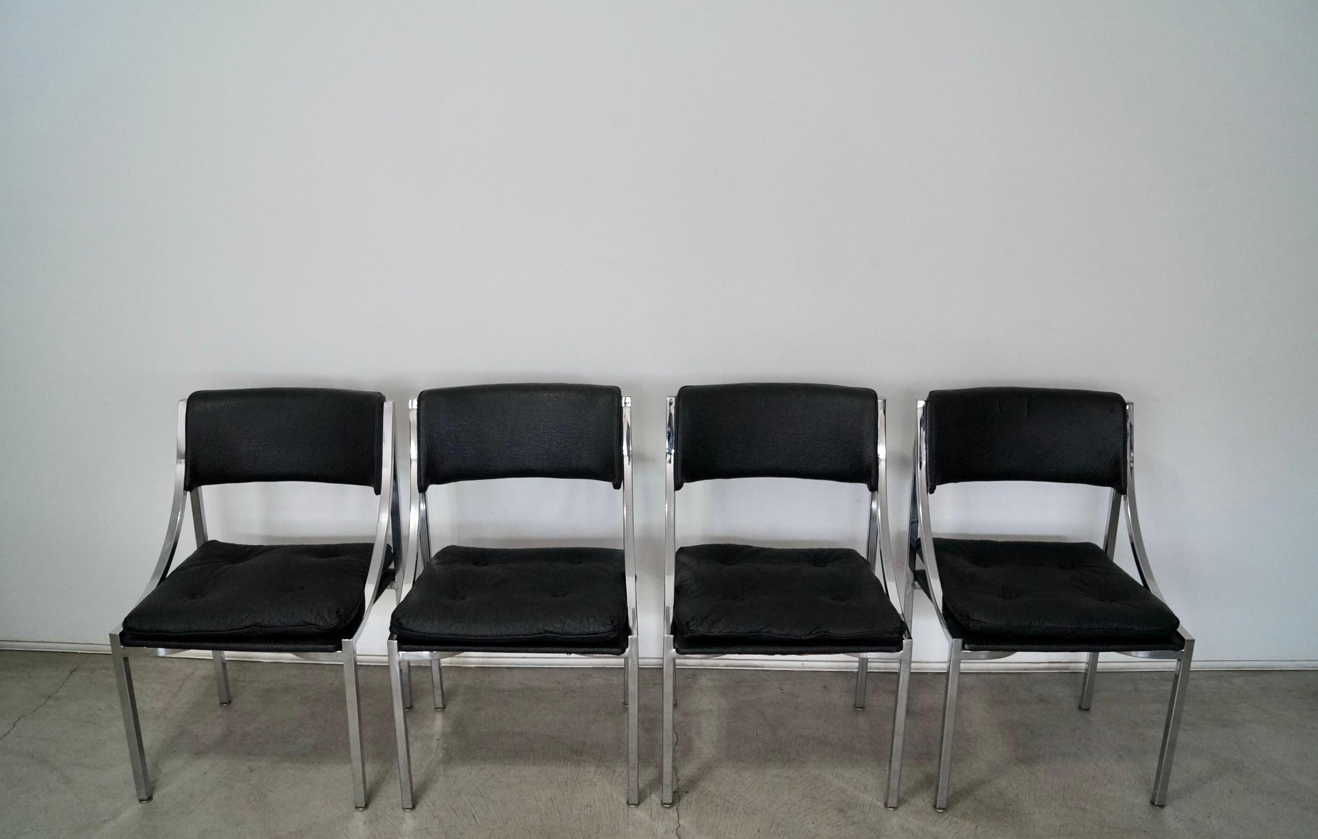 Mid-century Modern Bauhaus dining chair set for sale. Set of four chairs from the late 1960’s. Manufactured by Howell in California, and very rare. They have a solid chrome frame with an imitation leather vinyl with texture. The chairs have a loose