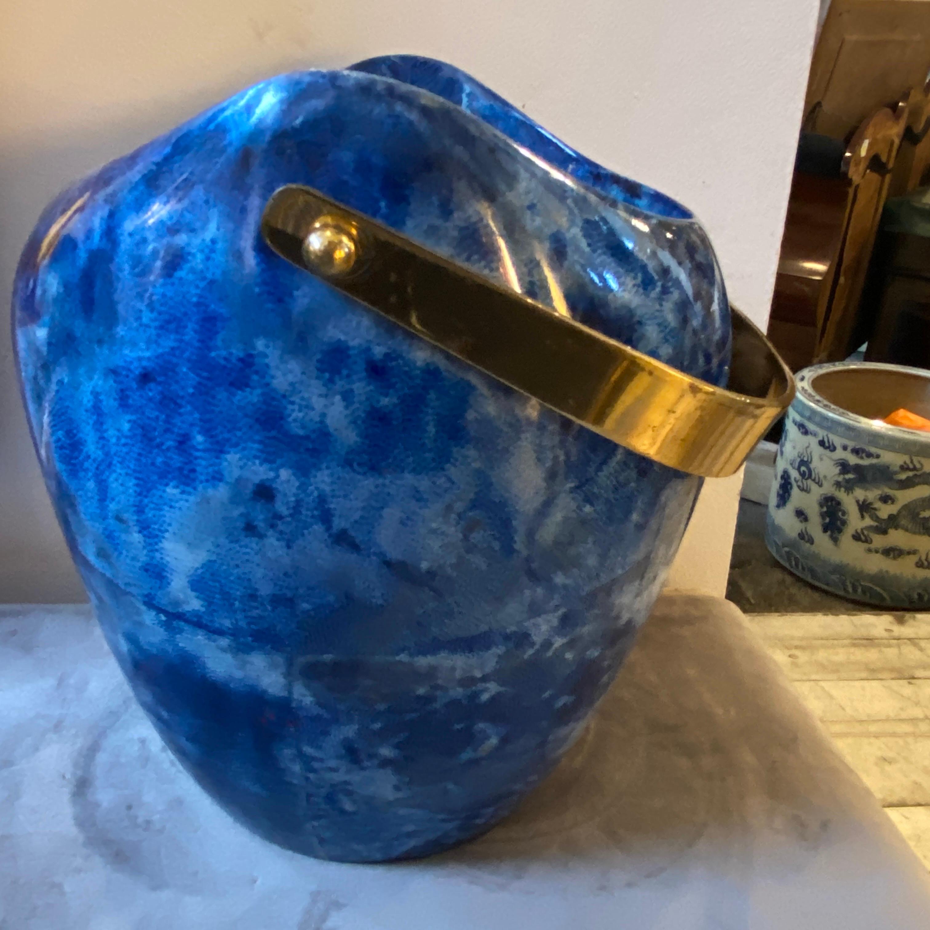 A rare brass and goatskin wine cooler also usable as an ice bucket made in Italy In the Sixties, it's in good conditions. It's marked on the bottom by the producer Macabo. The blue color of the goatskin it's extremely rare and makes it very