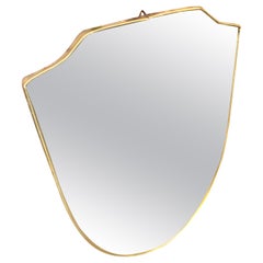 shiny brass shield 1960s Mid-Century Modern Brass Shield Wall Mirror in the Manner of Giò Ponti