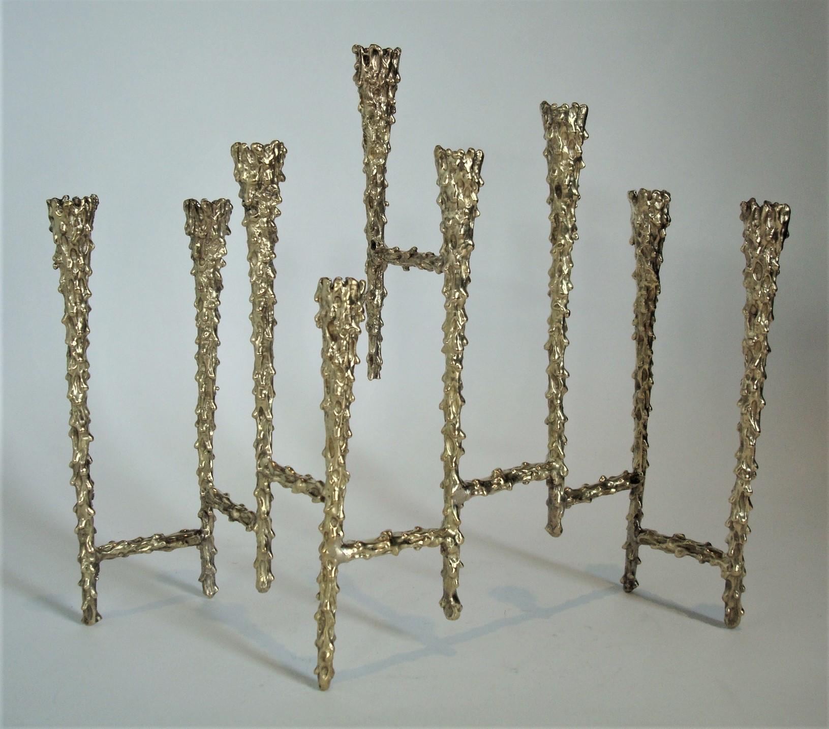 Handcrafted 1960s Brutalist candleholder in excellent condition out of solid brass.
Truly exquisite menorah in the Brutalist style. This piece is made of chased brass with intricate surface decoration. A spectacular, sculptural piece in excellent