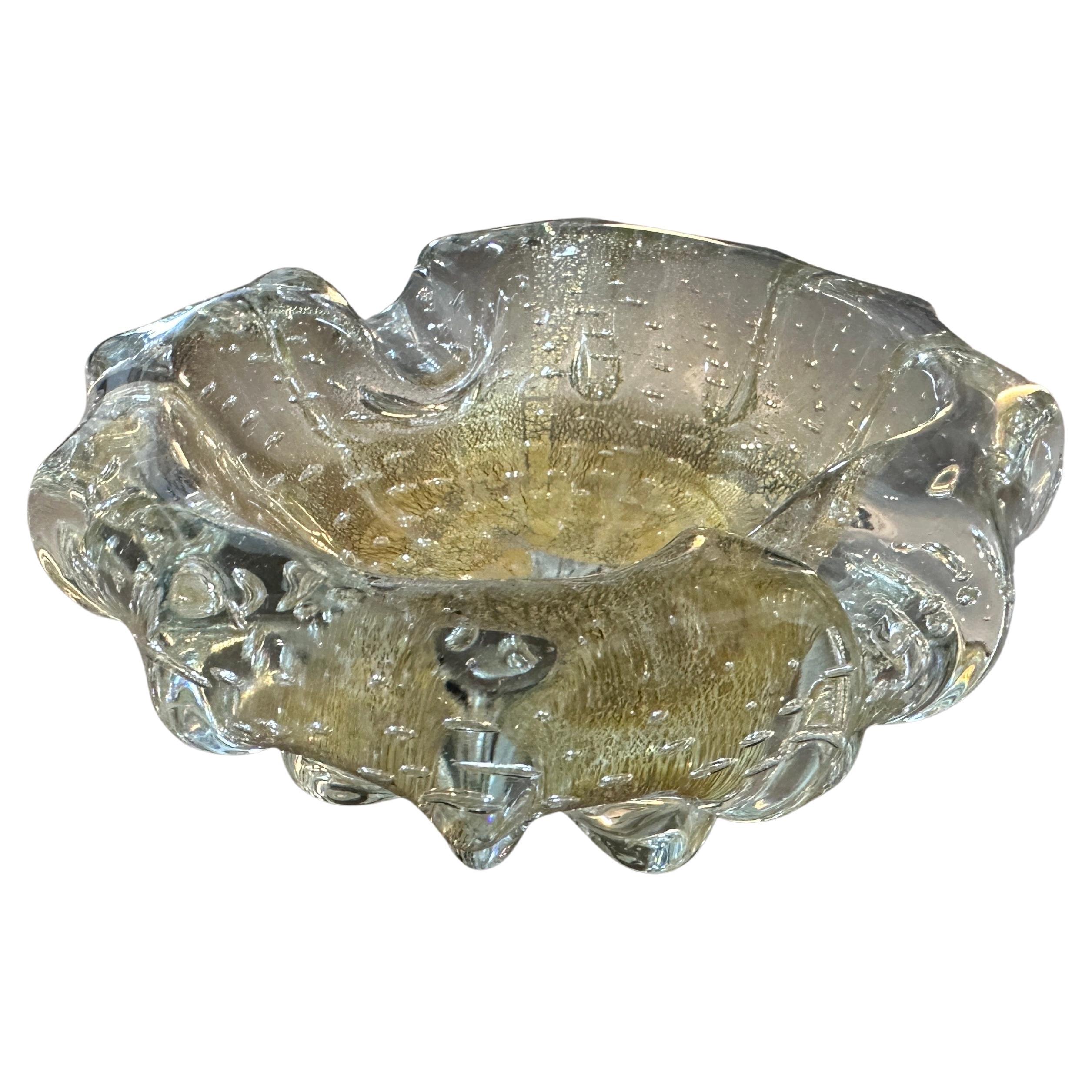 A murano glass ashtray designed and manufactured in Italy by Barovier in the Sixties, it's in very good condition. This Murano Glass Ashtray by Barovier is a fascinating and collectible piece of Murano glassware. Murano glass, produced on the island