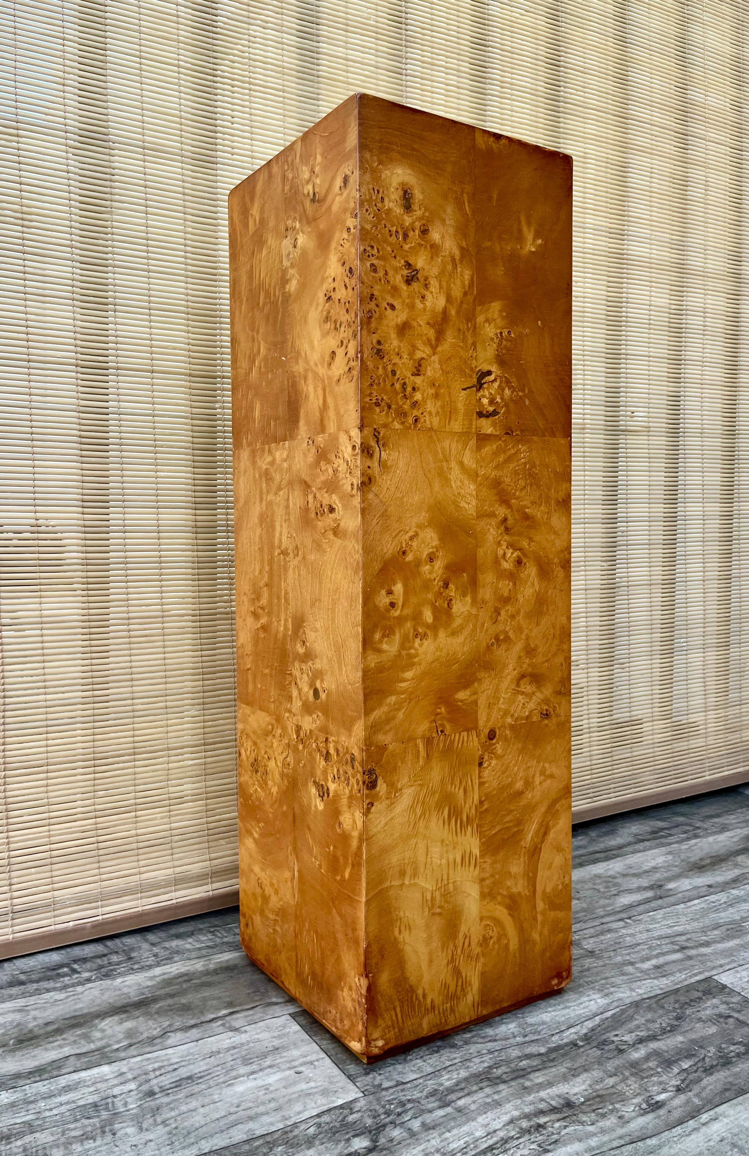 1960s Mid Century Modern Burl Pedestal / Column in the Milo Baughman Style. 
Features a rich olive burl wood veneer and a brutalist inspired design. 
In good restored condition with minor signs of wear consistent with age and history. Please see