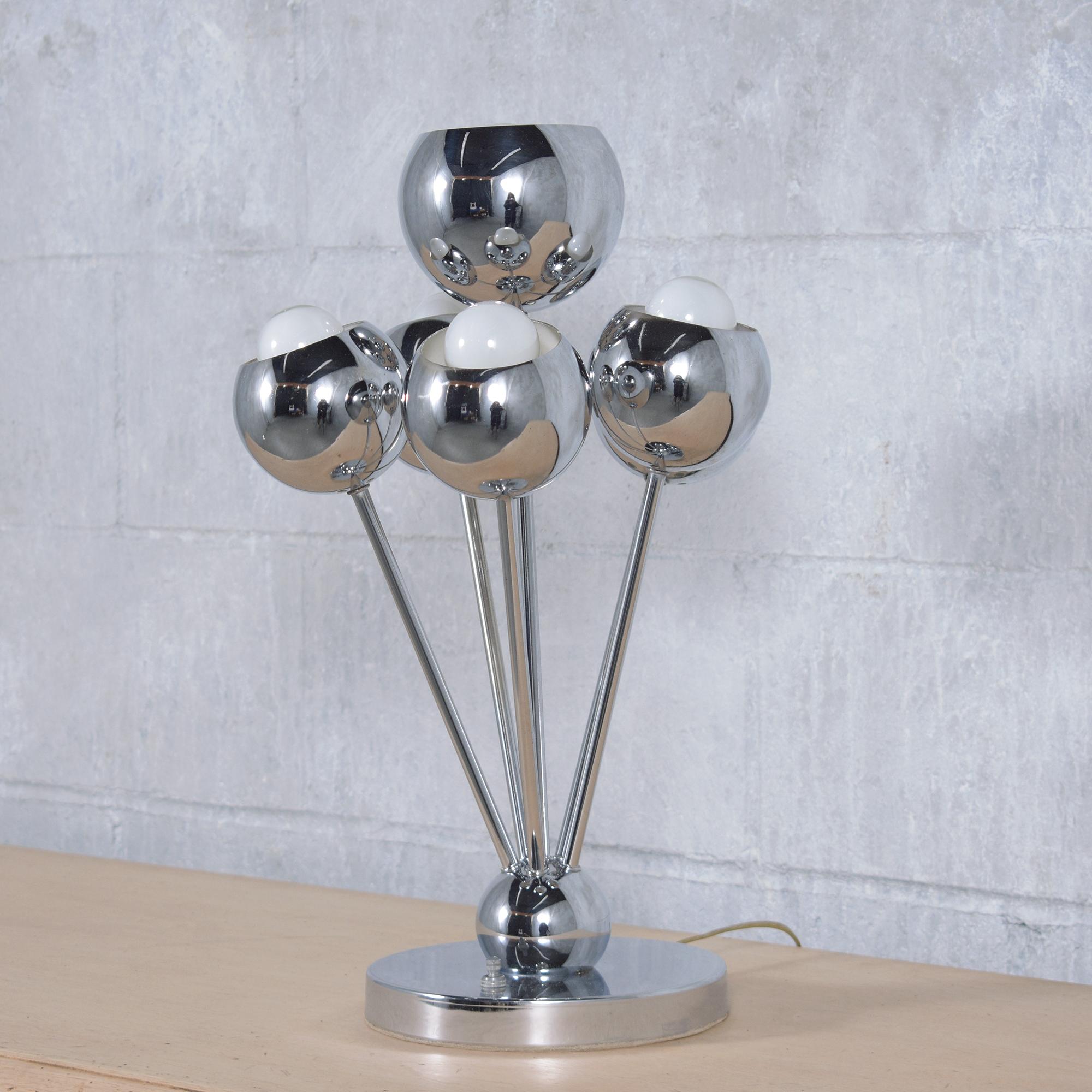 Immerse yourself in the iconic style of the 1960s with our mid-century modern table lamp, a perfect emblem of the era's space-age and atomic design influences. Crafted from steel and finished in sleek chrome, this lamp has been meticulously restored