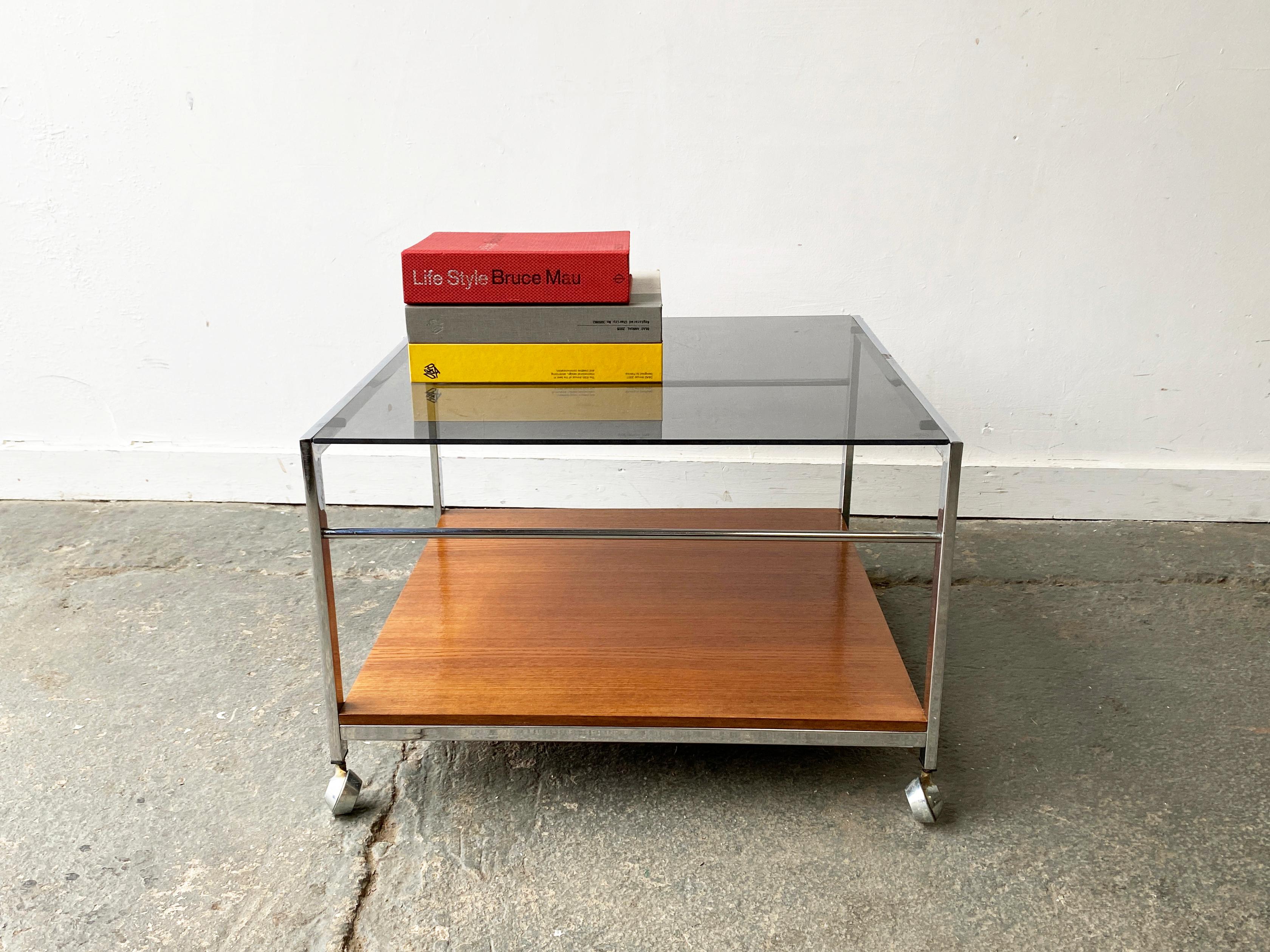 An MDA (Miller Design Associates) coffee table designed by Howard Miller of Sussex. The style is very similar to renowned British maker Merrow Associates who produced extremely high end pieces at the same time.

The coffee table has a chrome and