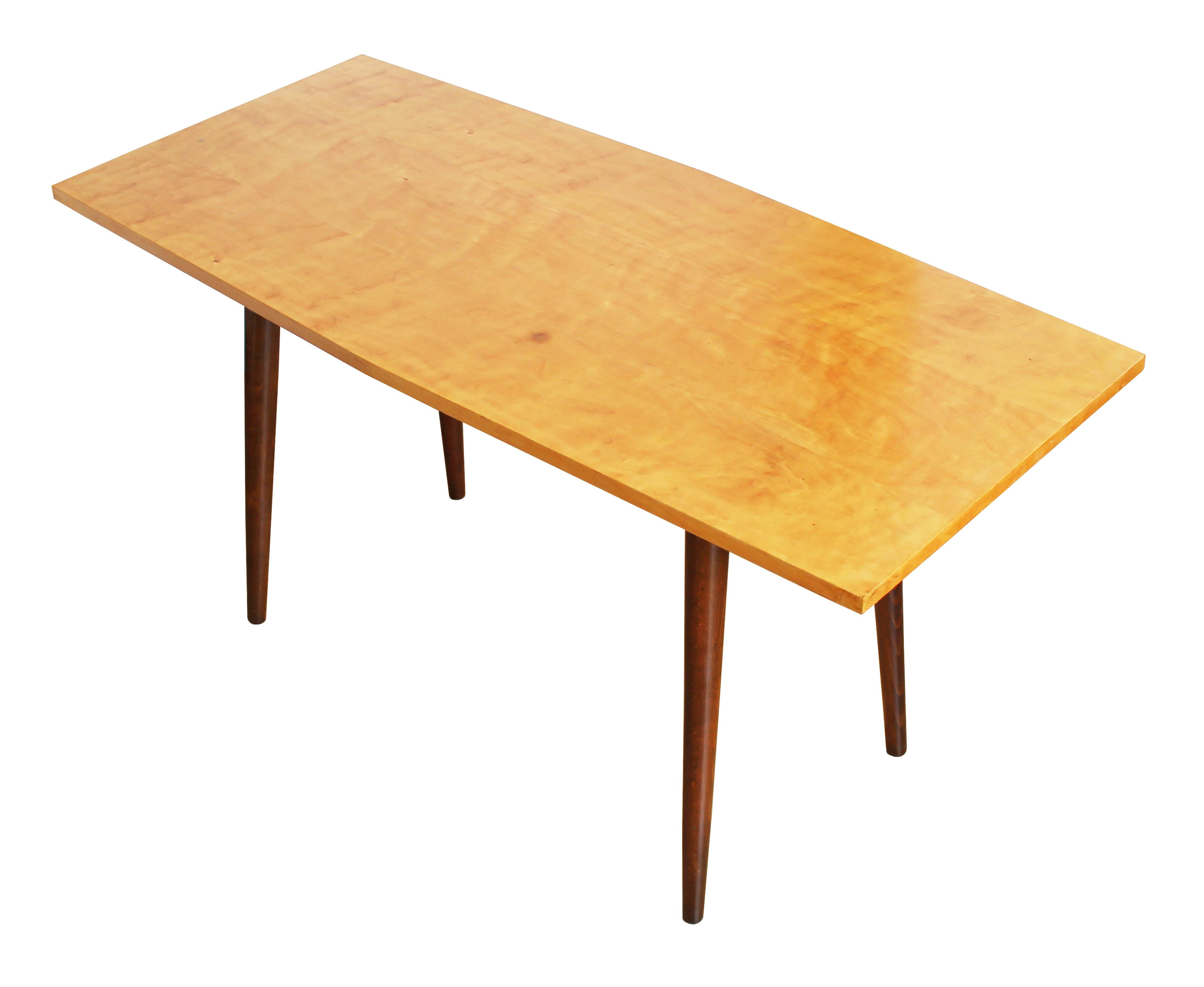 An original coffee table in excellent condition which was produced by UP Zavody in 1960s, in former Czechoslovakia.

We are not aware of the designer but we know that this piece was designed in the so-called Czech Brussel style with a visible