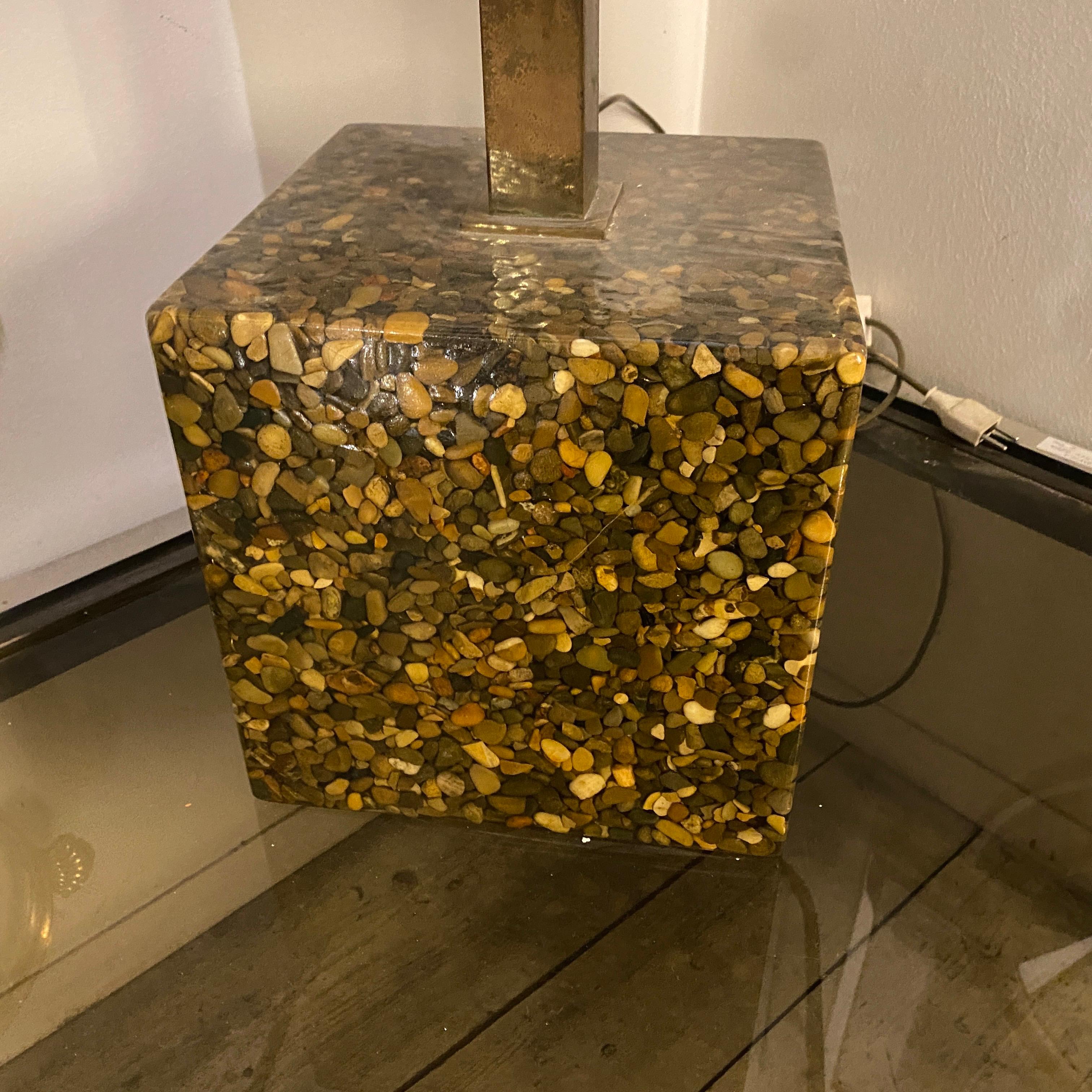 A resin and stone cube table lamp made in Italy in the Seventies. High quality brass parts are in original patina, the original rectangular lampshade has been upholstered on a black velvet. Height without lampshade is 68 cm, base cube side dimension