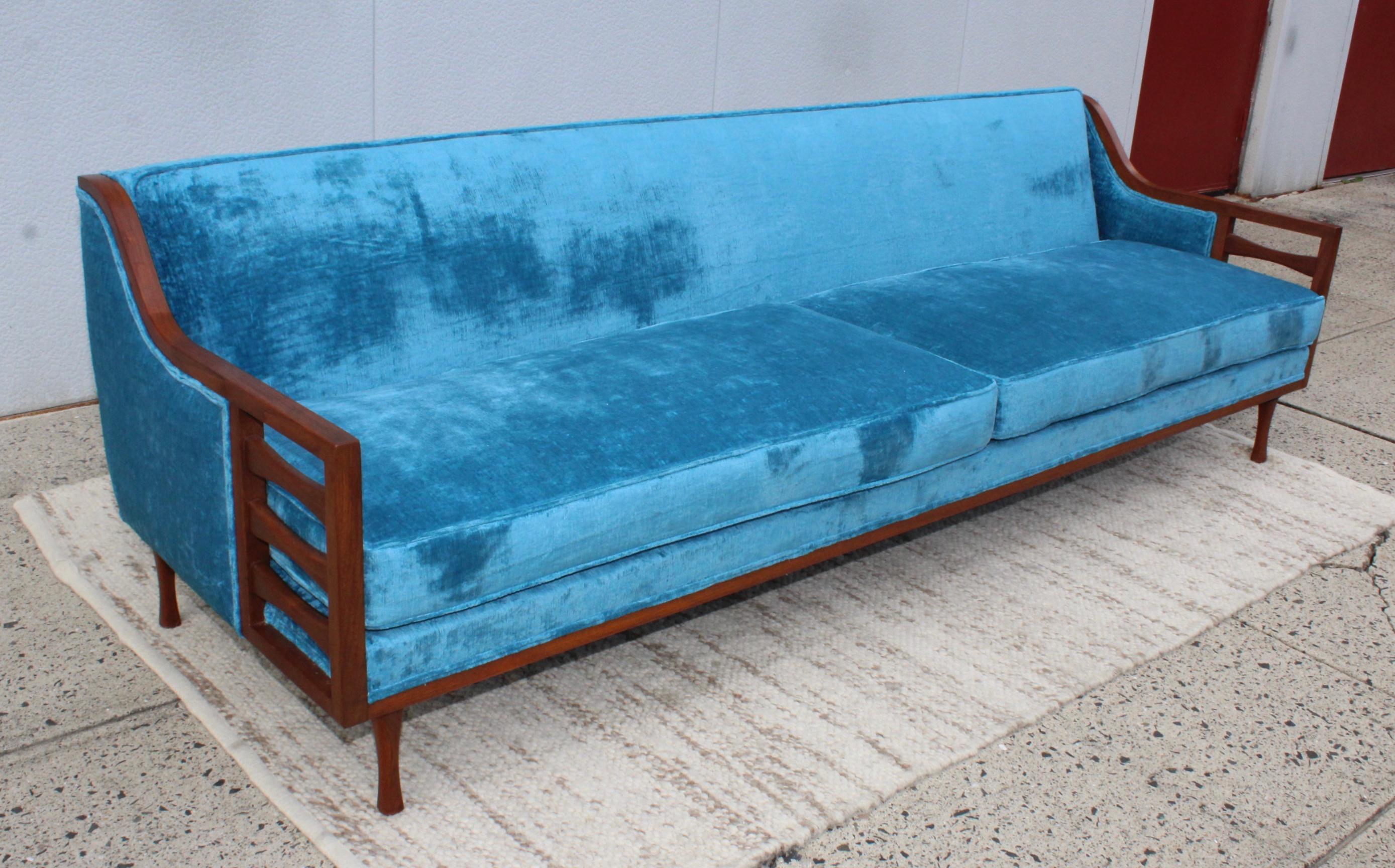 Stunning 1960s Mid-Century Modern walnut custom made 8 foot long walnut sofa, newly reupholstered in velvet.