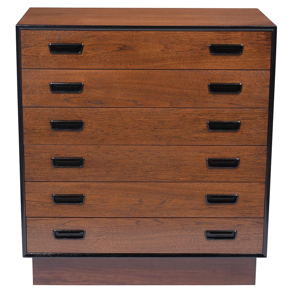Embrace the timeless sophistication of Danish design with our 1960s mid-century chest of drawers, a piece that masterfully blends the warmth of teak wood with the depth of walnut color. This vintage dresser has been handcrafted with precision,