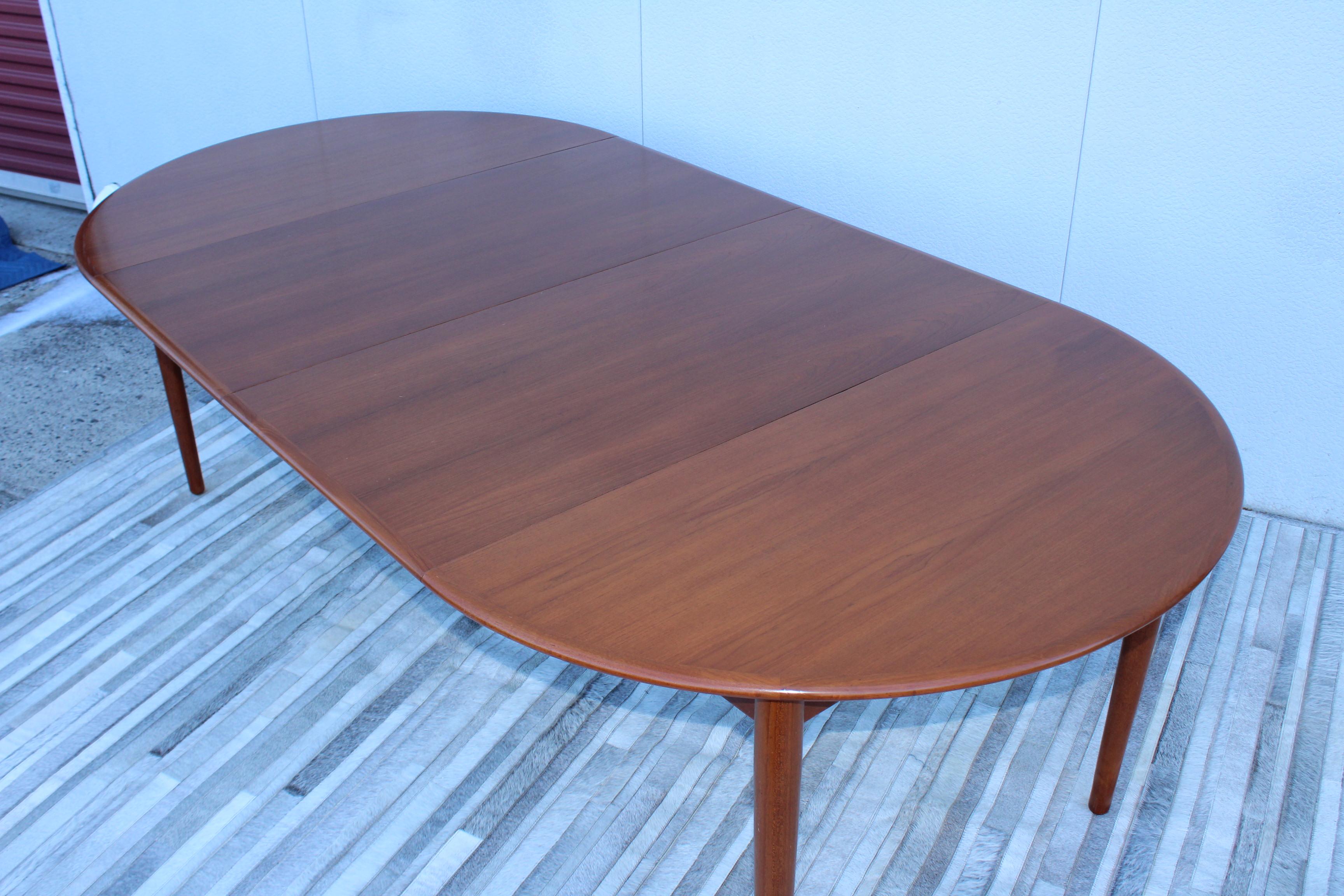1960's Mid-Century Modern Danish Teak Round Dining Table with Two Leaves 9