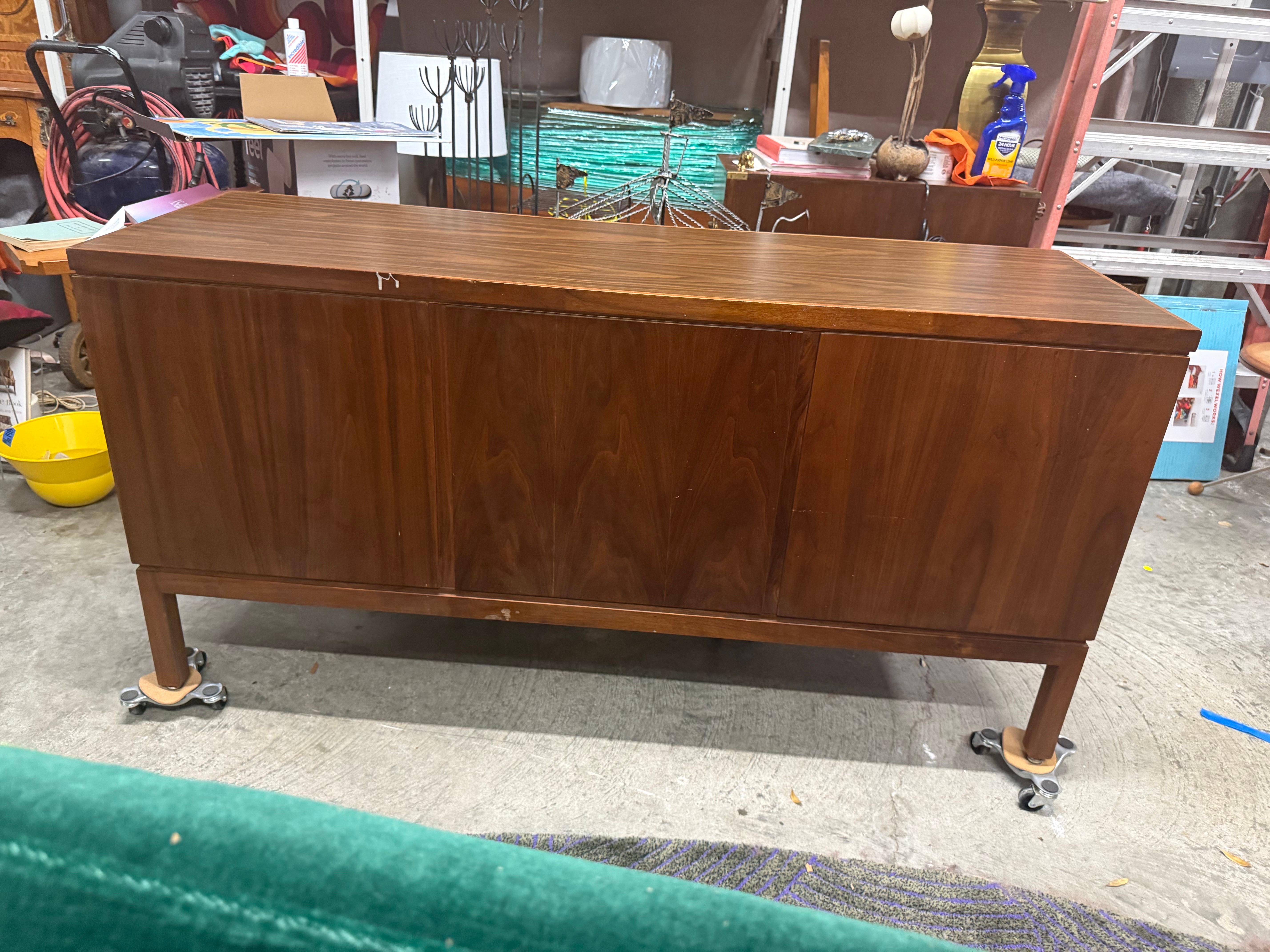 Kimball style Credenza / Office Cabinet with File Drawers. 

Quality craftsmanship and materials in this walnut executive Credenza. Features 2 file drawers with 2 additional drawers and a large storage area with adjustable shelves. Formica top