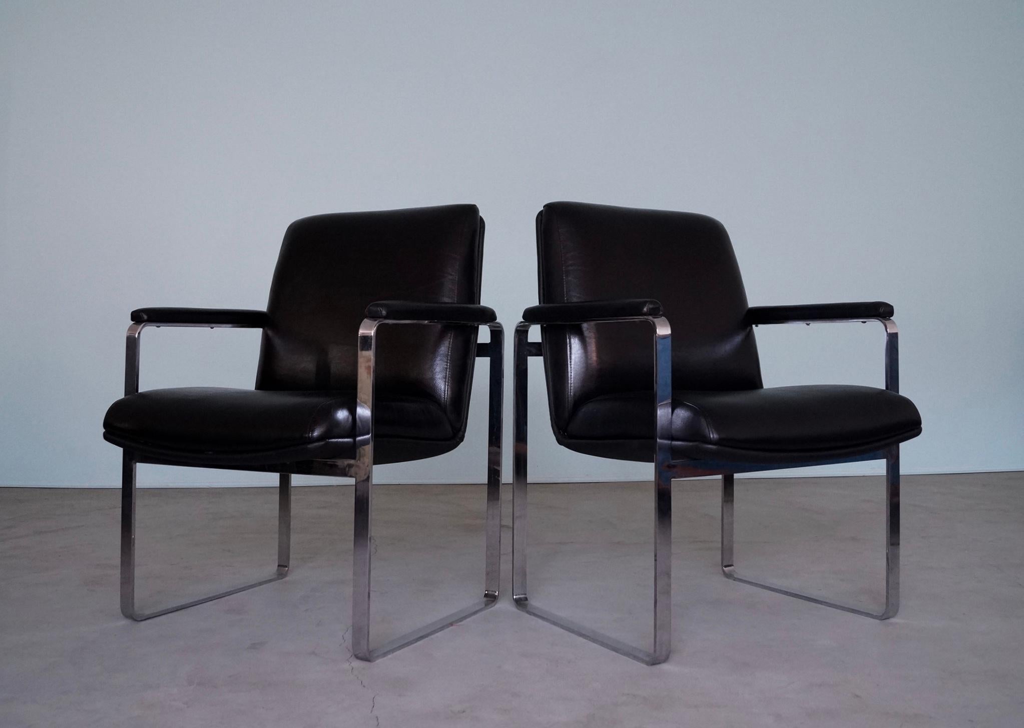 We have this incredible pair of Mid-century Modern lounge chairs for sale. They are original from the 1960's, and are rare designs. They were previously professionally reupholstered in vintage black leather, and are exceptional! Their designs are