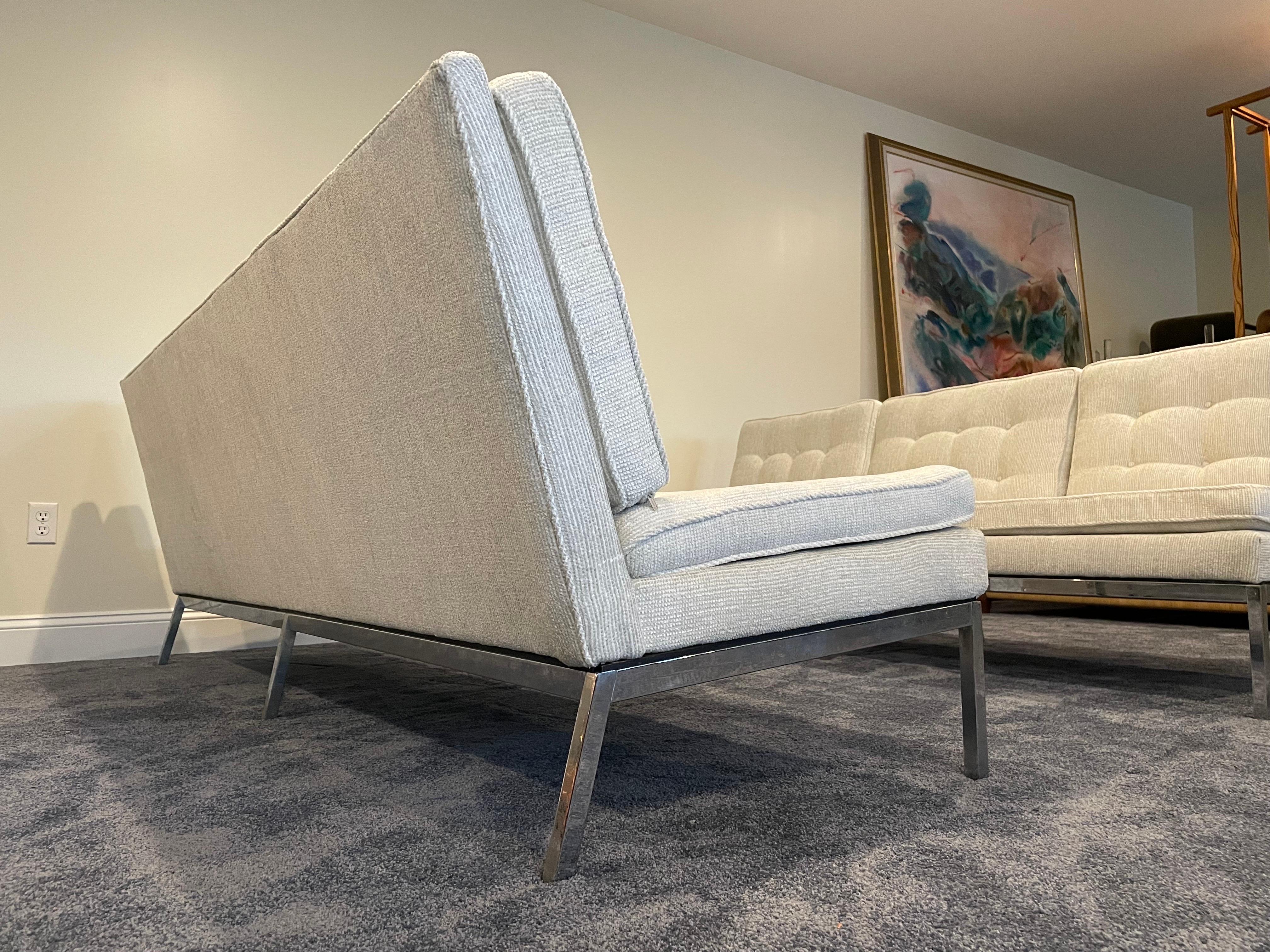 The Florence Knoll armless slipper sofas are a stunning example of mid-century modern design. A classic piece that has stood the test of time, the sofas are a testament to the enduring appeal of Knoll's work. The chrome base adds a sleek and modern