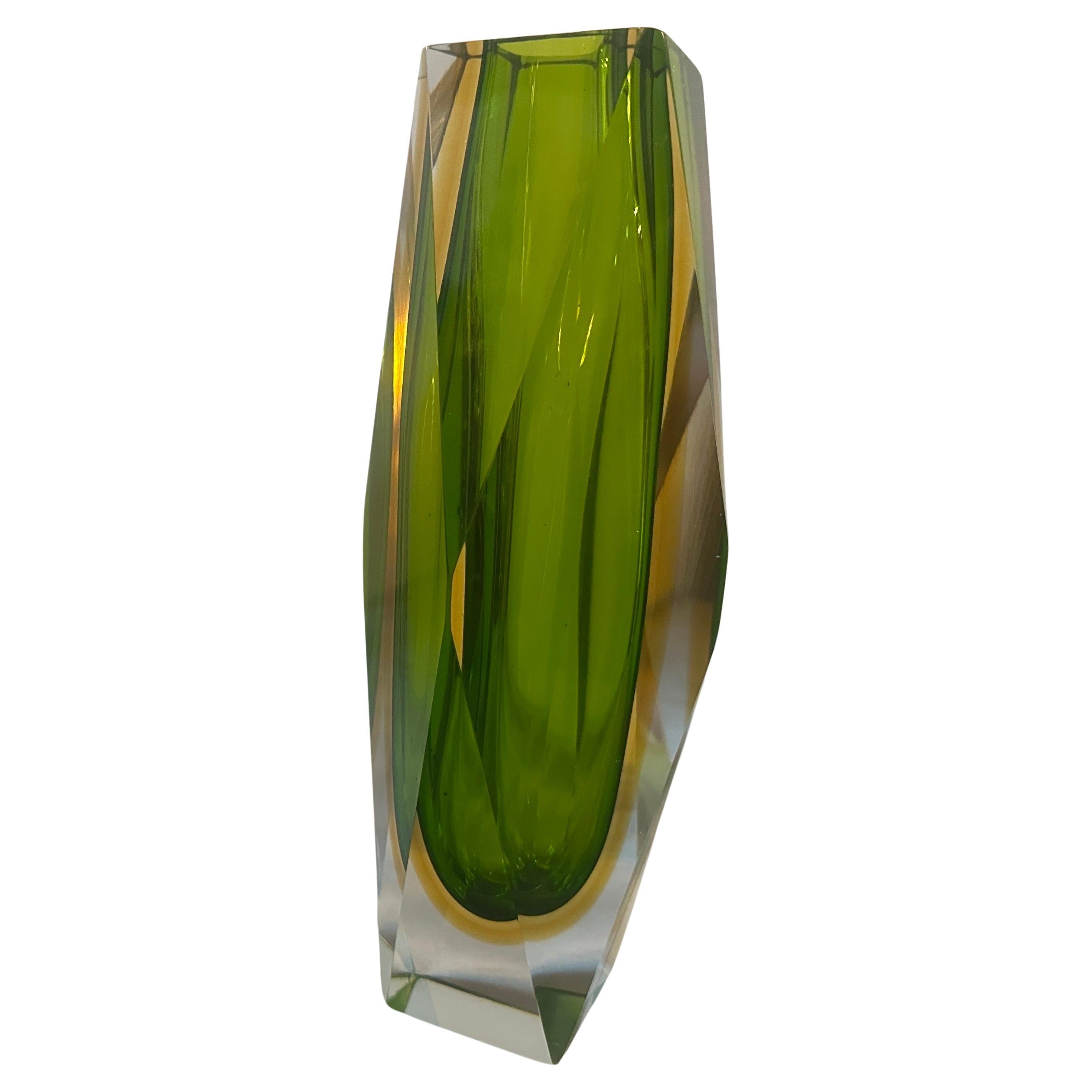 A perfect condition vase designed and manufactured in Venice by Seguso in the Sixties. This Murano glass vase is a vintage decorative piece that represents the distinct craftsmanship and design style of Murano glass from that era. Murano glass is