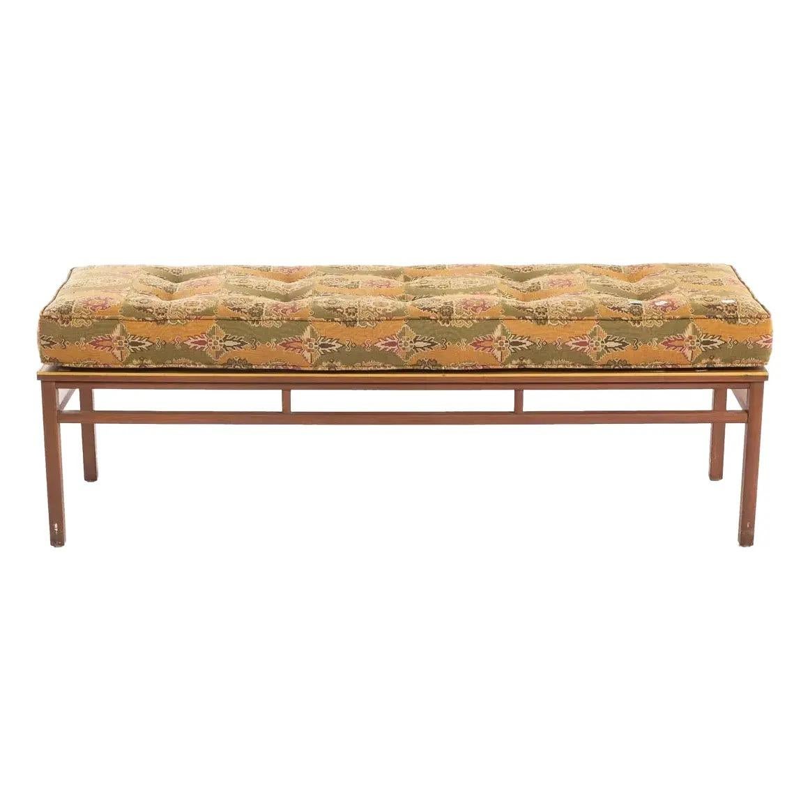 A beautifully preserved Mid-Century Modern bench by Imperial Furniture Co., crafted in the 1960s. This elegant piece features a solid walnut frame with clean architectural lines and a rich, warm finish. The original tufted cushion is upholstered in