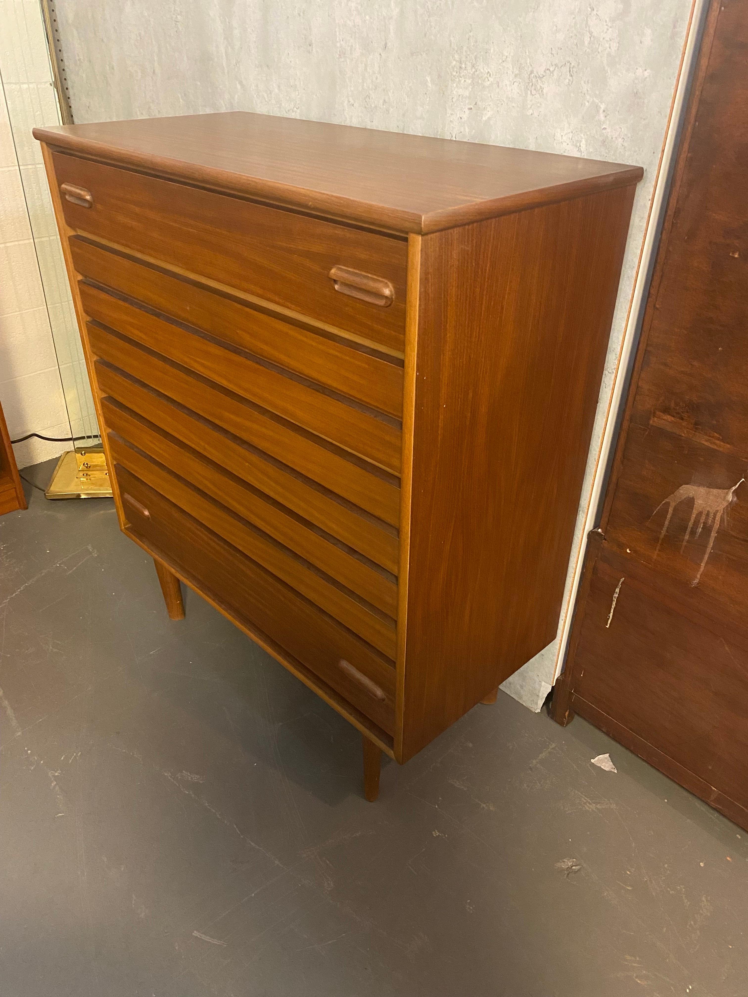 Gorgeous Mid-Century Modern highboy dresser. Marked inside the top drawer with 