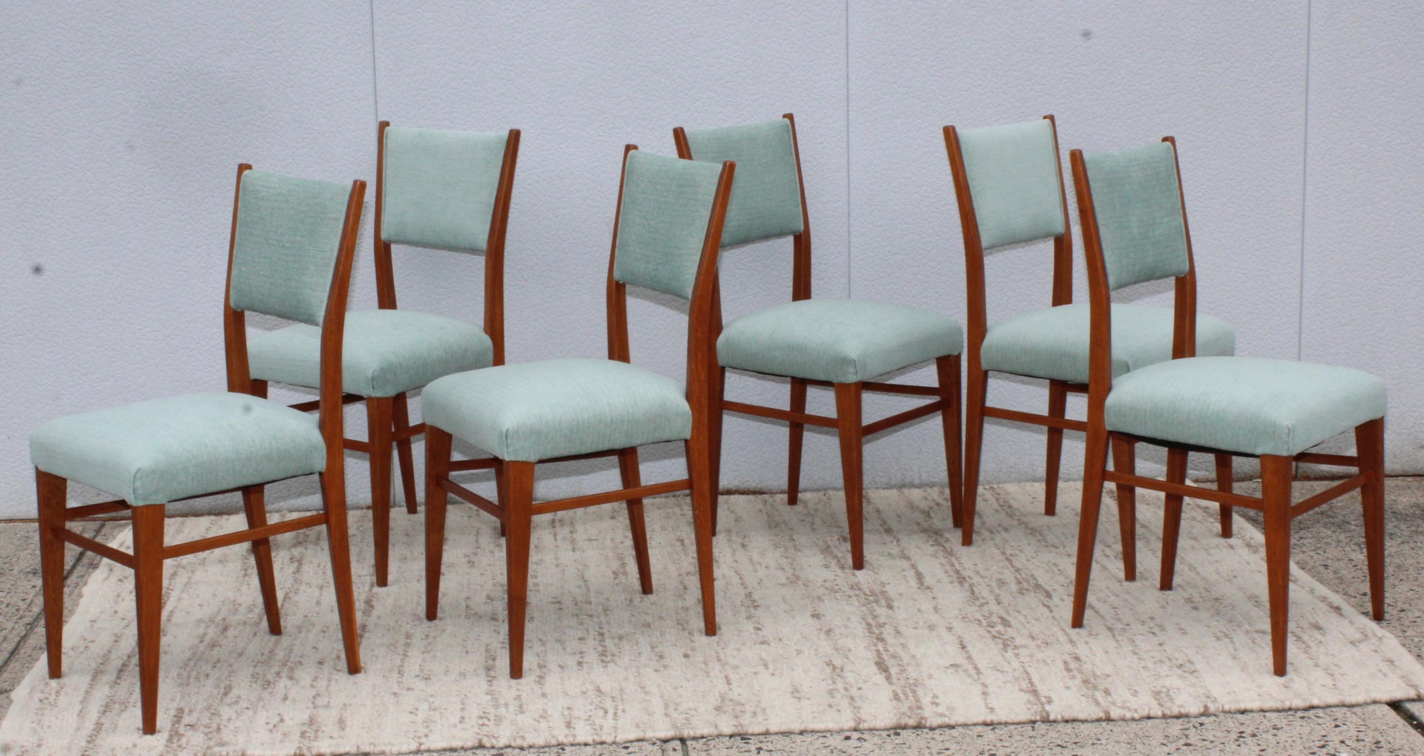 Stunning set of 6 1960's Mid-Century Modern Italian oak dining chairs, newly reupholstered and lightly restored.