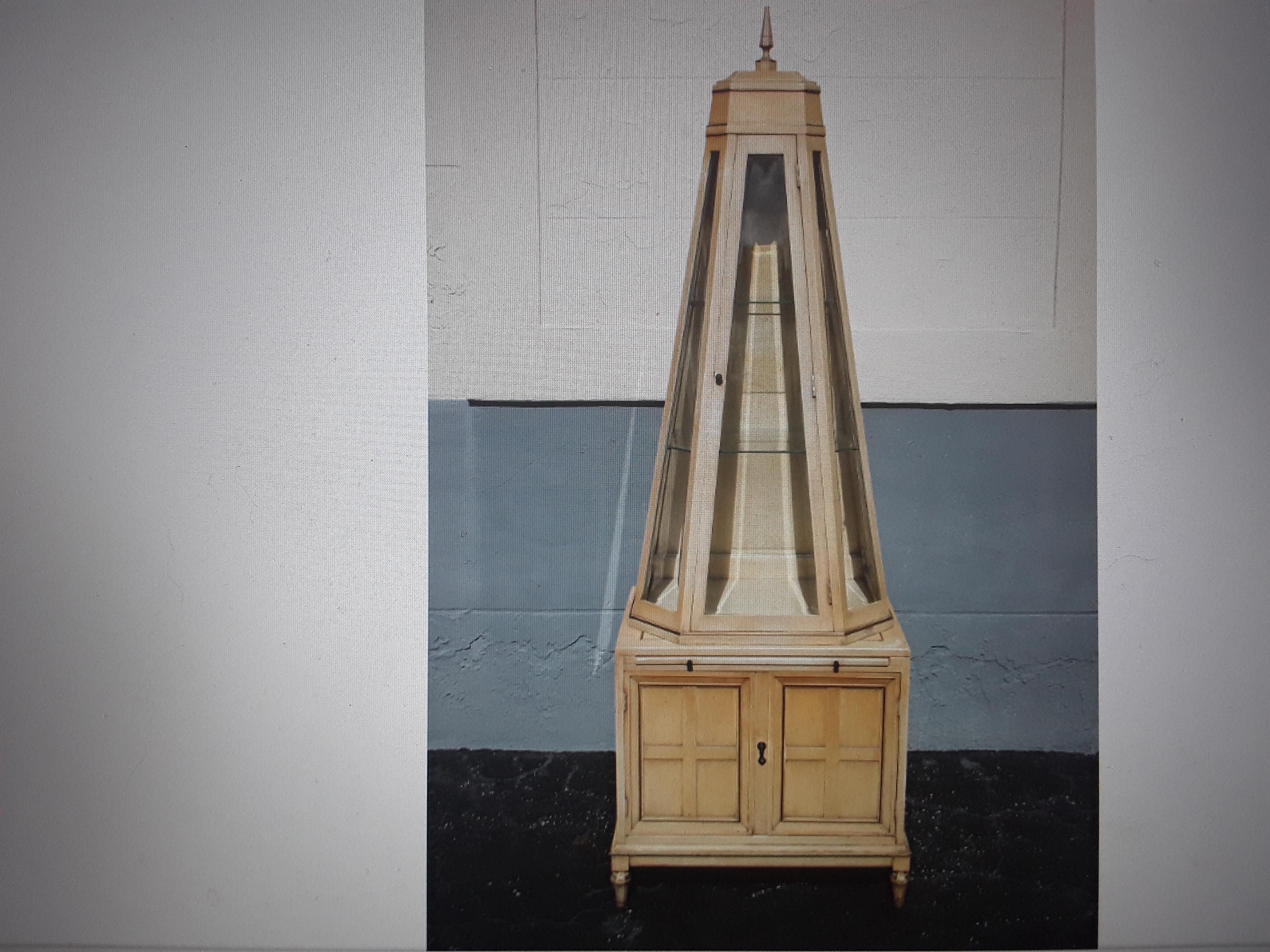Rare Form 1960's Mid Century Modern Obelisk Display Case/ Secretary/ Cabinet. This is the first time I have seen one like this. There is a writing area, storage cabinets and upper glass display case.
