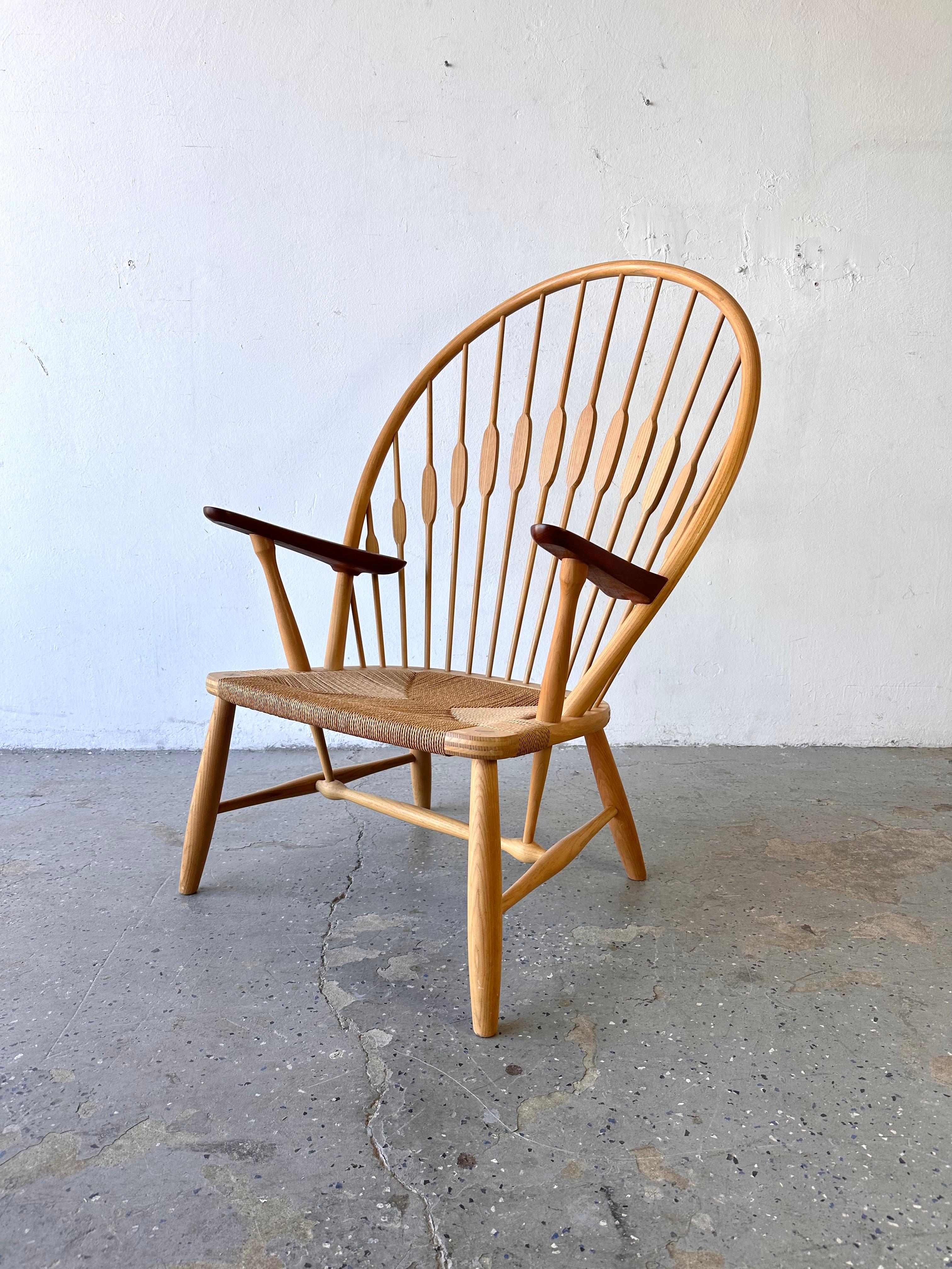 A Mid-Century Modern PP550 ‘Peacock’ chair designed by Hans Wegner in 1947 for Johannes Hansen.

Modeled after a traditional American Windsor chair, Hans Wegner’s Peacock chair strips the form to reveal its construction while retaining aesthetic,