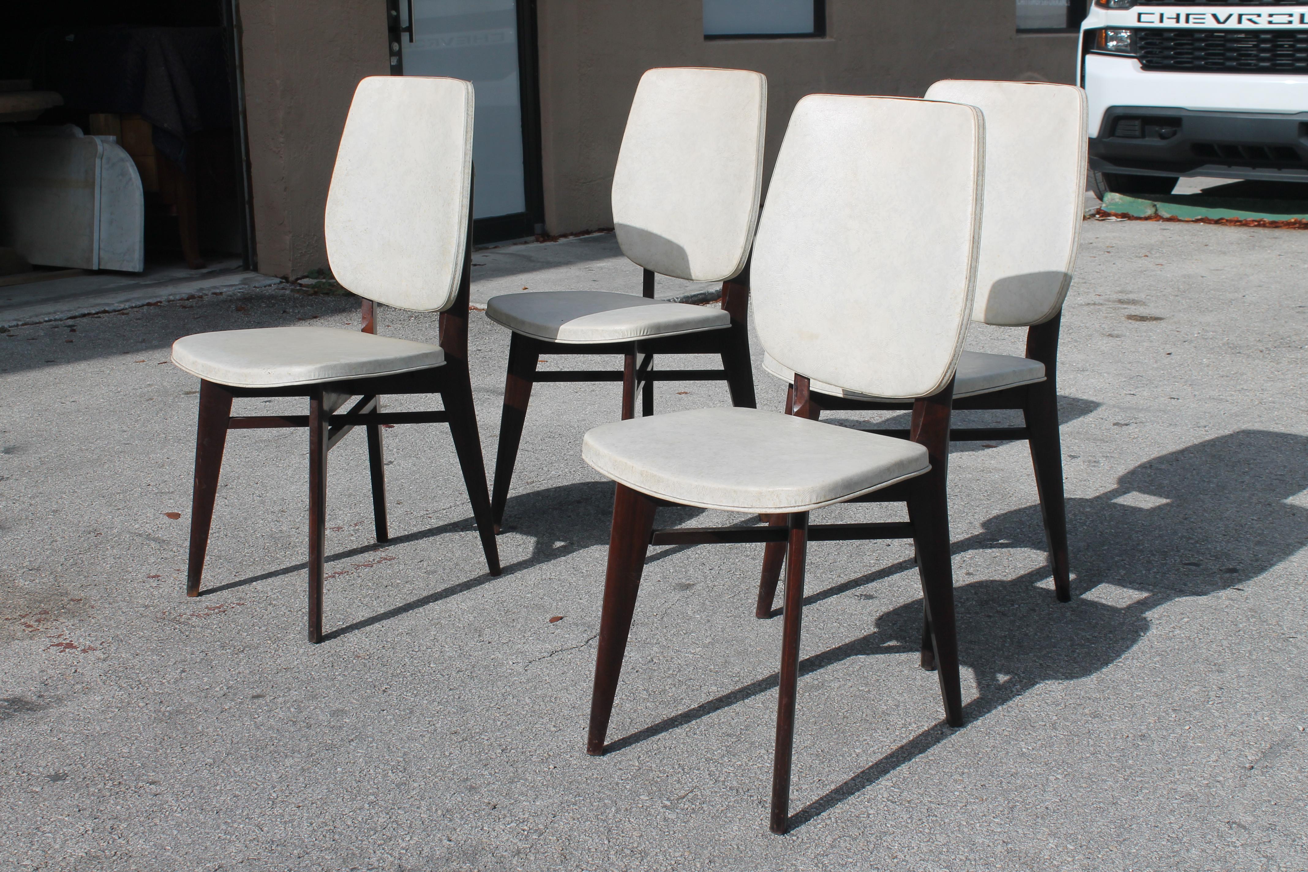 Set of 4 French Mid Century Modern Dining Chairs. As with all of our vintage seating we recommend reupholstery.