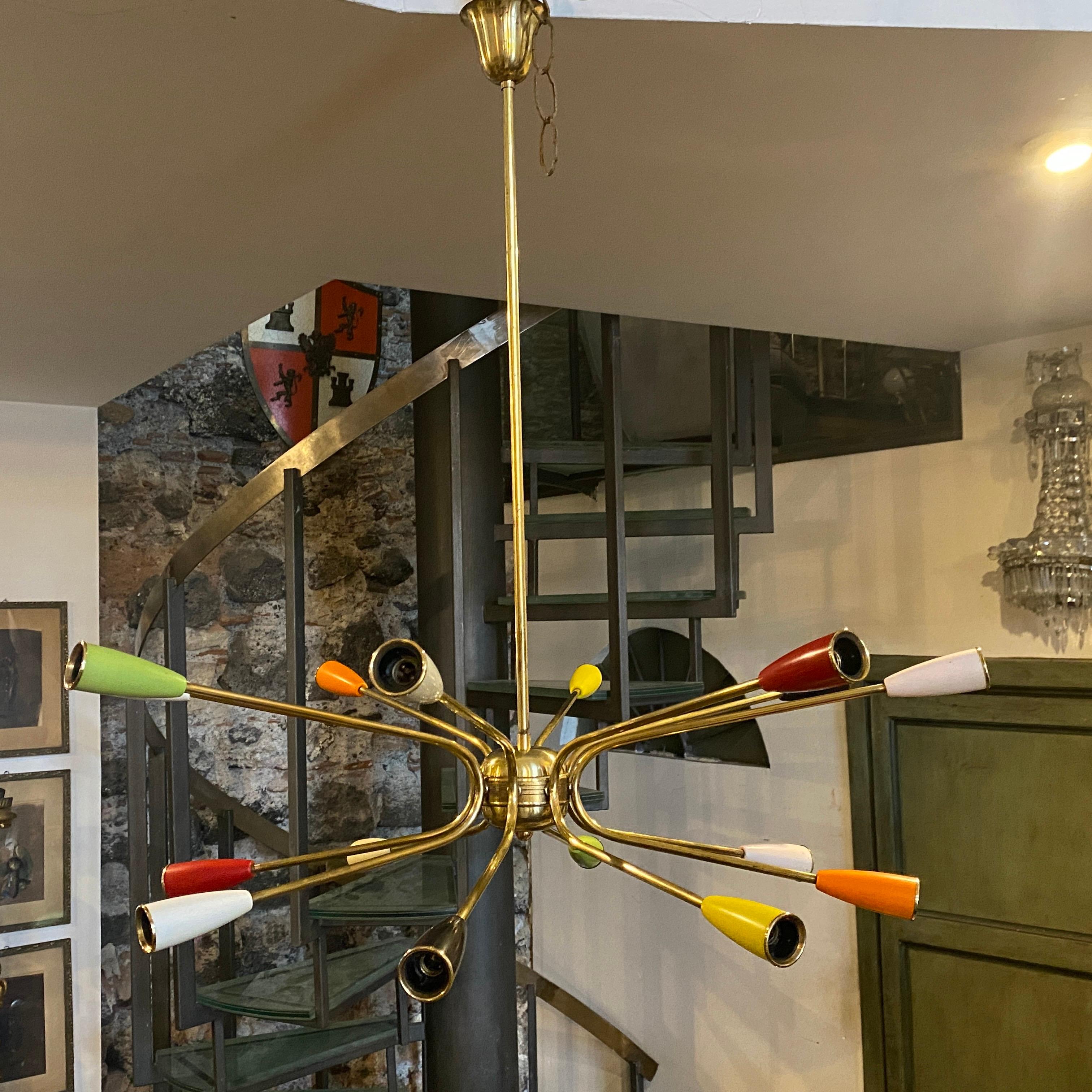 Amazing fully restored original sputnik chandelier made in Italy in the sixties, solid brass has been cleaned, in the last pics you can see the chandelier in original conditions, plastic bulb holders are in original colors. It works 110-240 volts