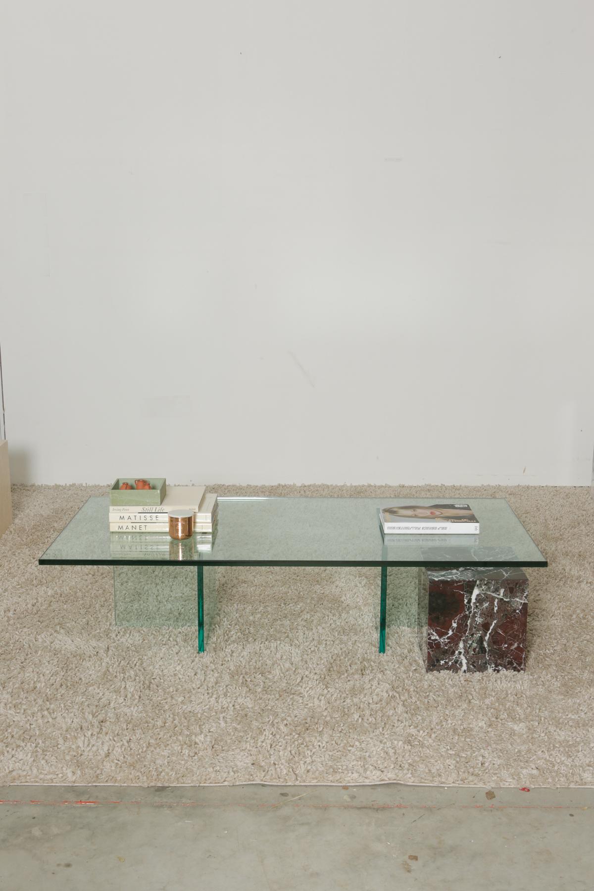 One of a kind, 1960s glass coffee table that was sourced from a New Yorker. It was previously gifted to them by a mentor and was well taken care of; therefore, the condition is in pristine condition with minimal signs of use considering the age.