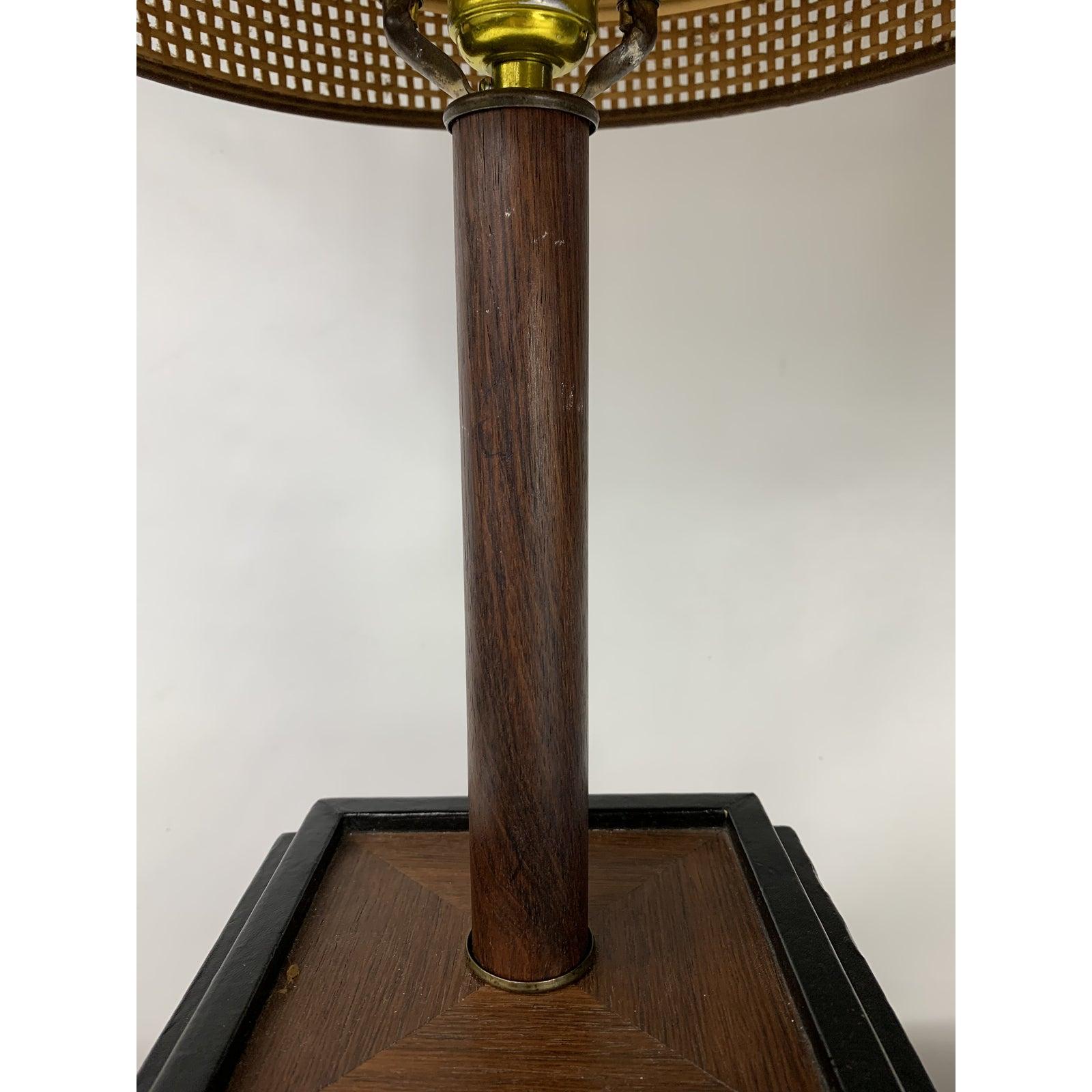 Great solid teak mid century weighted table lamp with wicker and fiberglass shade. Great unique lamp, very nice design.
