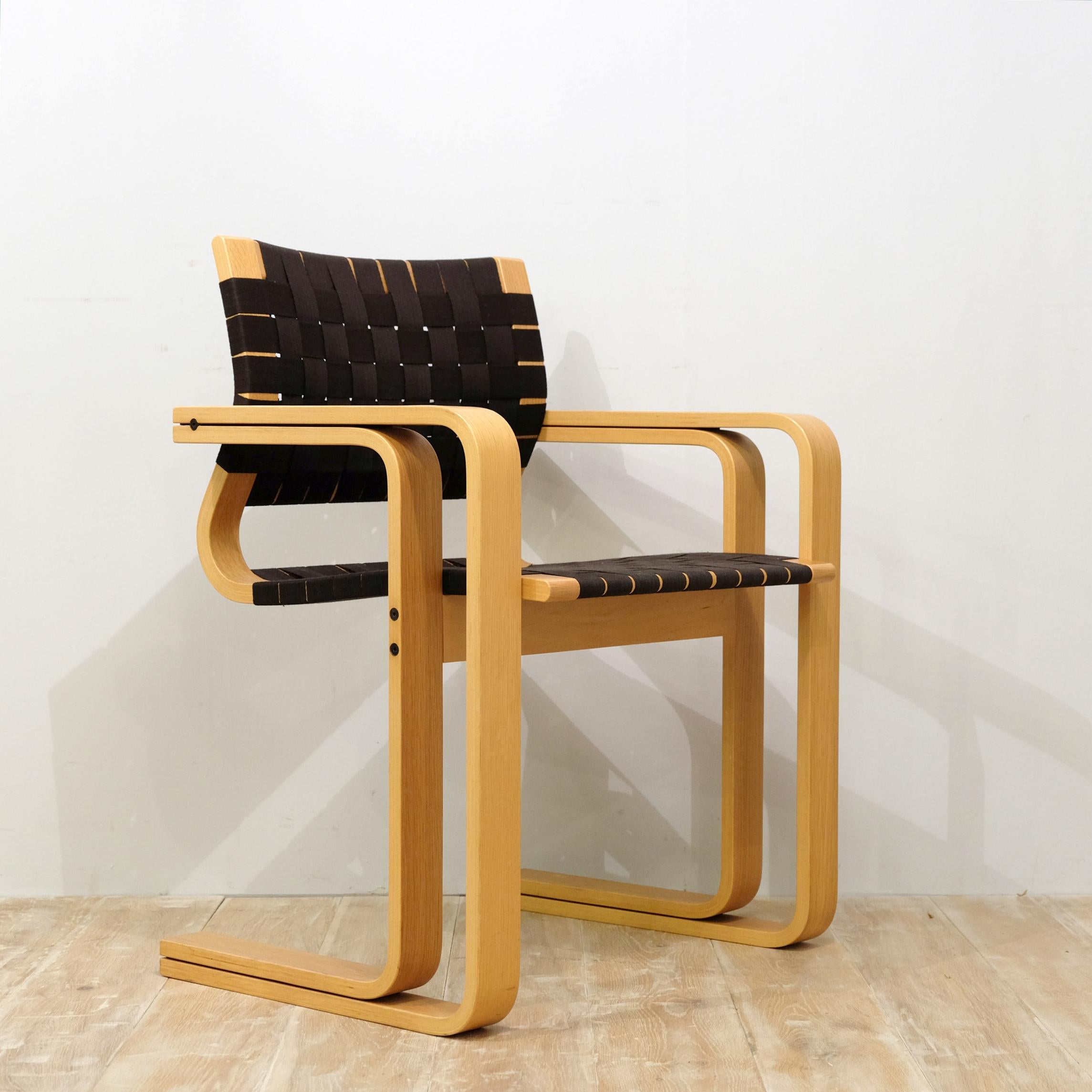 Danish midcentury steam-bent birch ply chair designed by Norweigens Rud Thygesen & Jonny Sorenson for Magnus Olesen, model number 5331. With interwoven black canvas seat and backrest, all in exceptionally good clean condition. Original label present