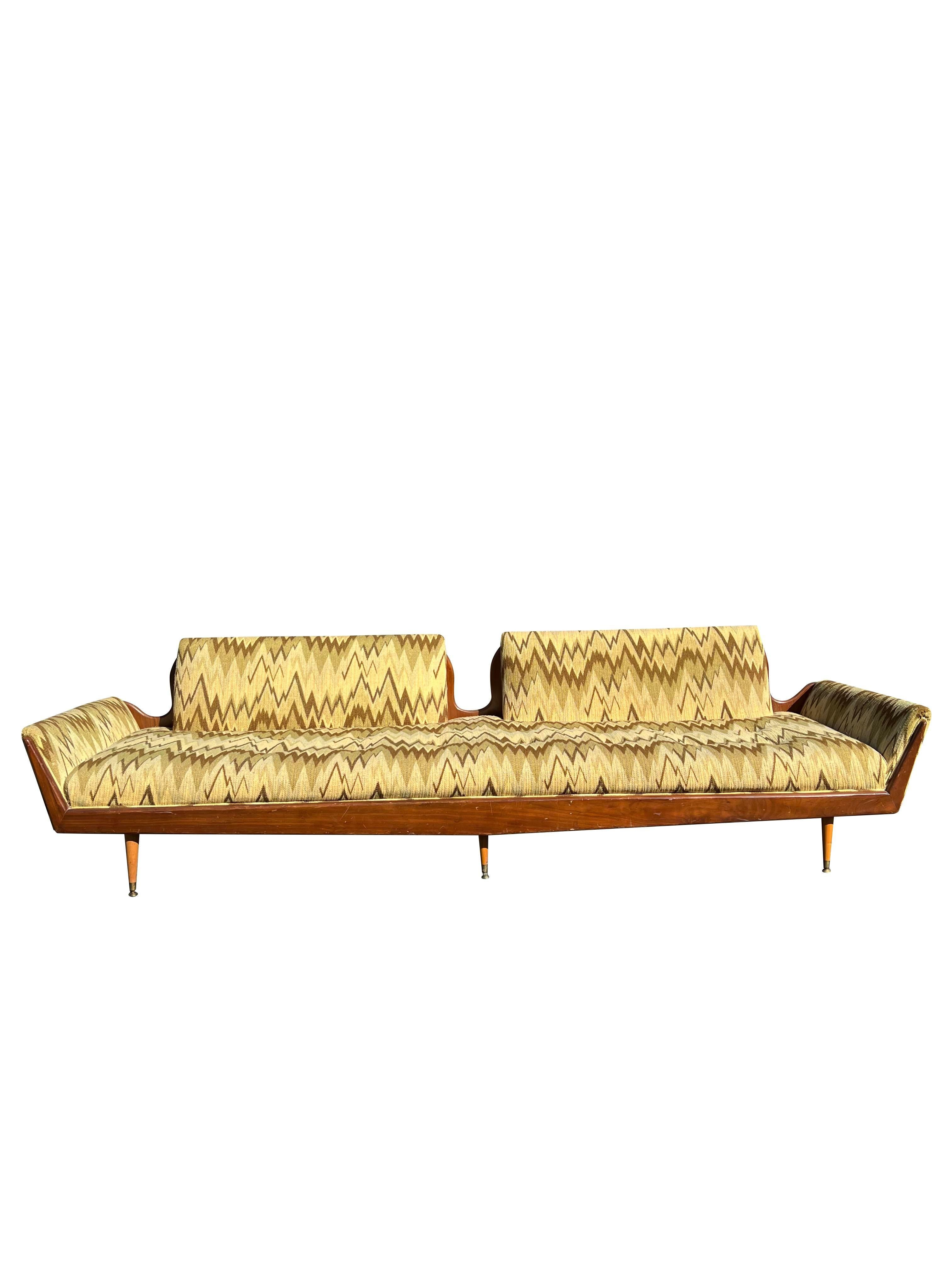 Vintage Mid-Century Modern Long Gondola Sofa
*NO legs, legs have been removed you can add screw in legs. 

Vintage: 1960s Mid-Century Modern Long Gondola Sofa
Style: Inspired by Adrian Pearsall
Design: Monumental sofa/couch seating with wood