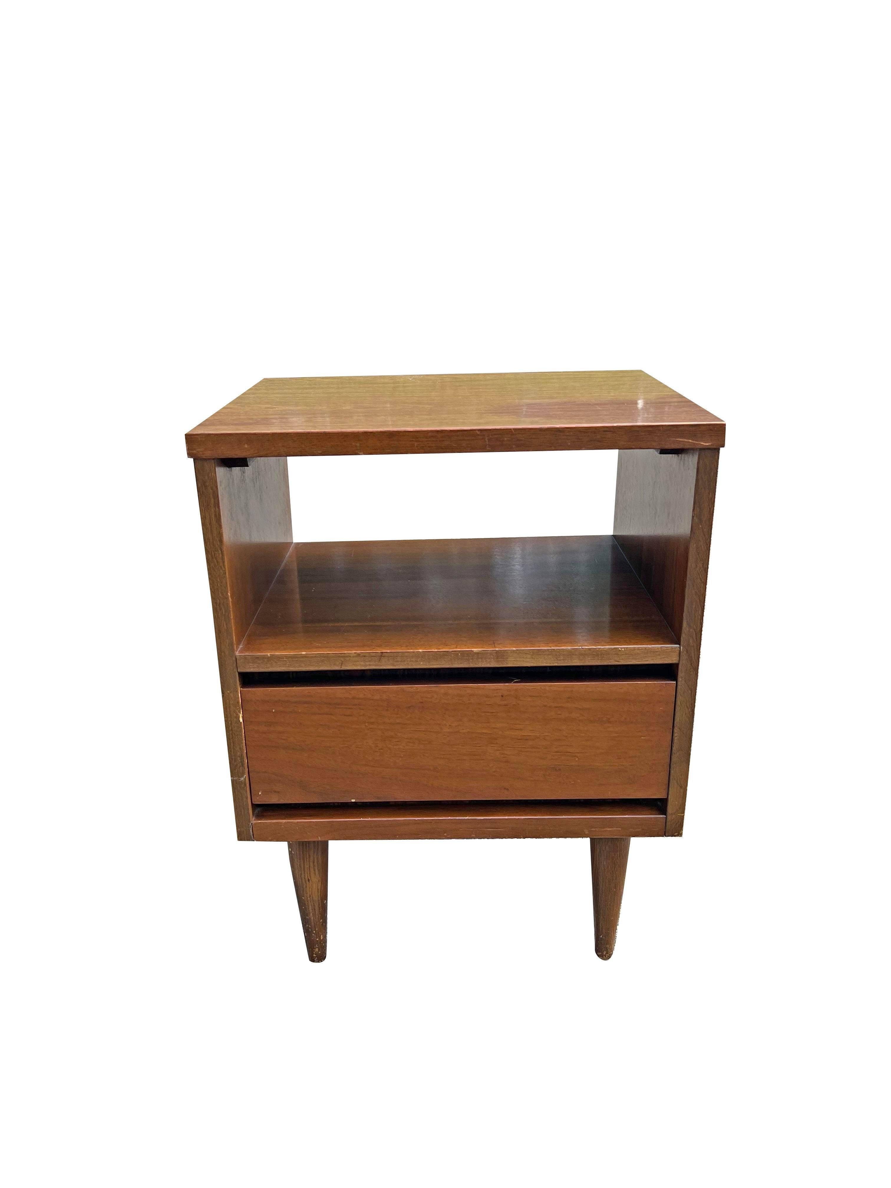 Vintage Mid-Century Modern Single Nightstand

This vintage nightstand is a must-have for anyone looking to add a touch of retro style to their bedroom. The unique design and functional features make it a versatile and stylish piece that will