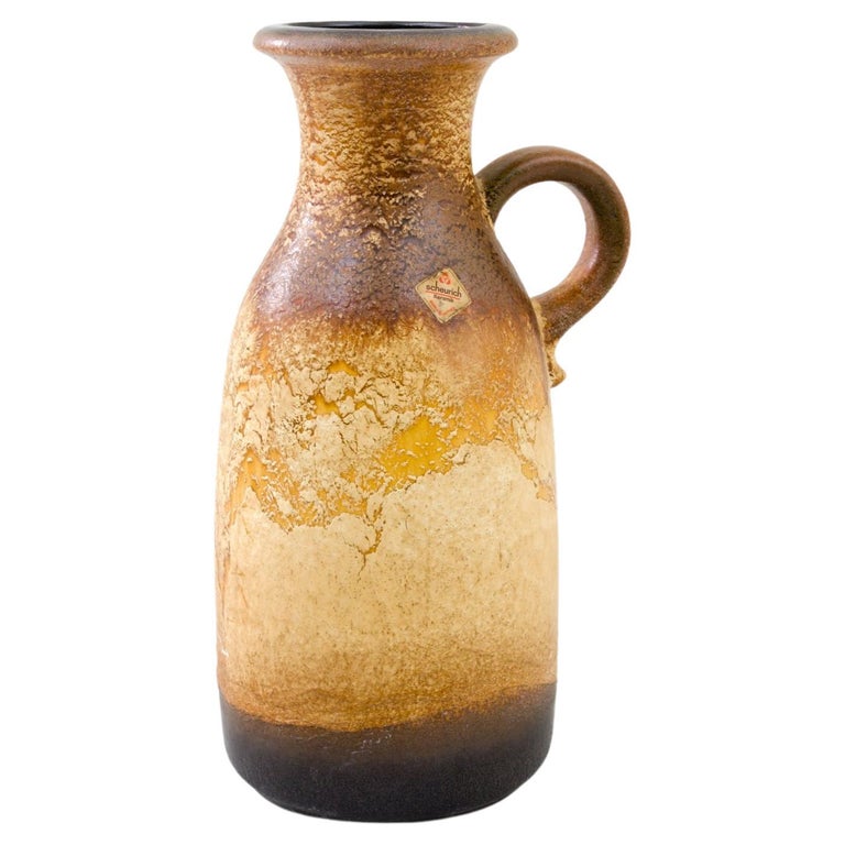 https://a.1stdibscdn.com/1960s-mid-century-modern-w-germany-ceramic-pitcher-for-sale/f_52802/f_372964121701218496521/f_37296412_1701218496876_bg_processed.jpg?width=768