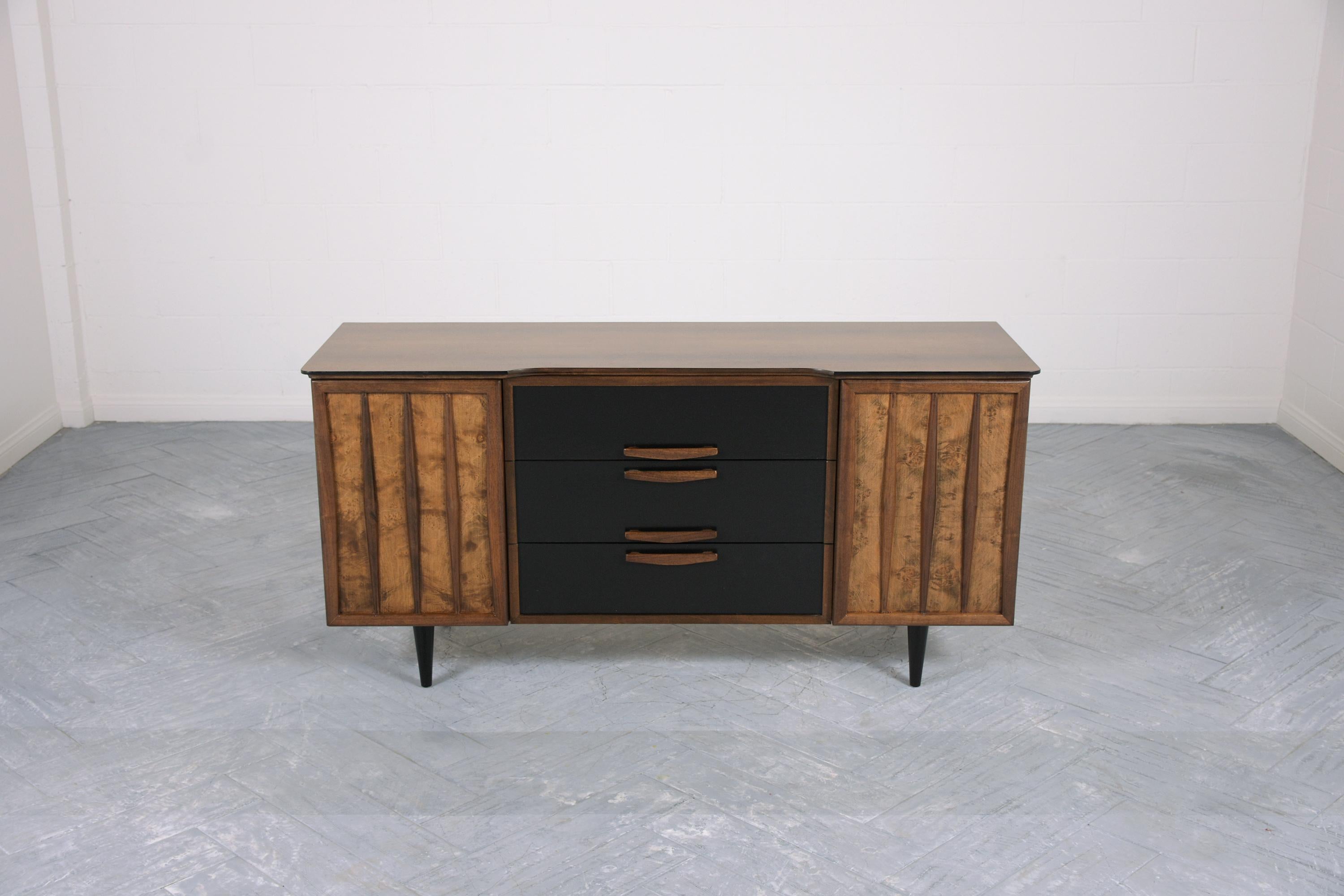 Discover our Mid-Century Modern Lacquered Walnut Credenza, a masterpiece of craftsmanship and design. This stunning piece, handcrafted from the finest walnut wood and adorned with elegant burled veneers, embodies the essence of mid-century modern