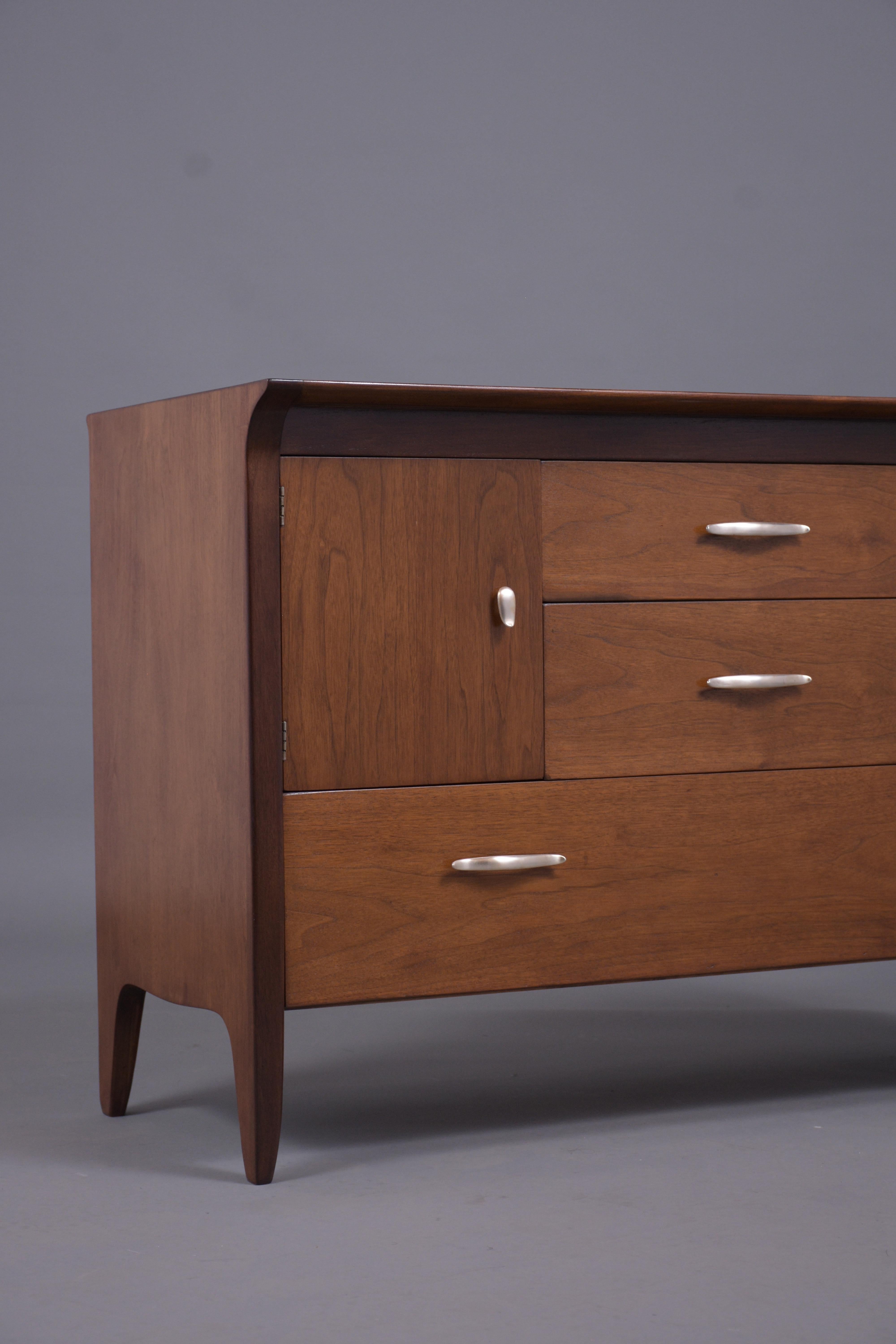 American Mid-Century Modern Walnut Chest of Drawers: 1960s Elegance Redefined For Sale