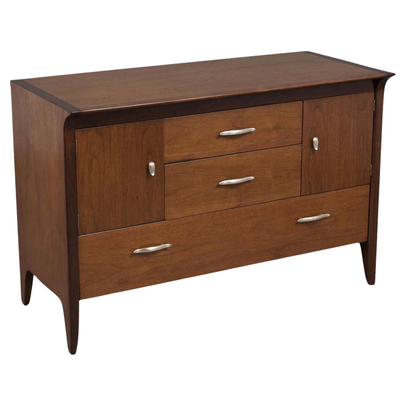 Mid-Century Modern Walnut Chest of Drawers: 1960s Elegance Redefined For Sale